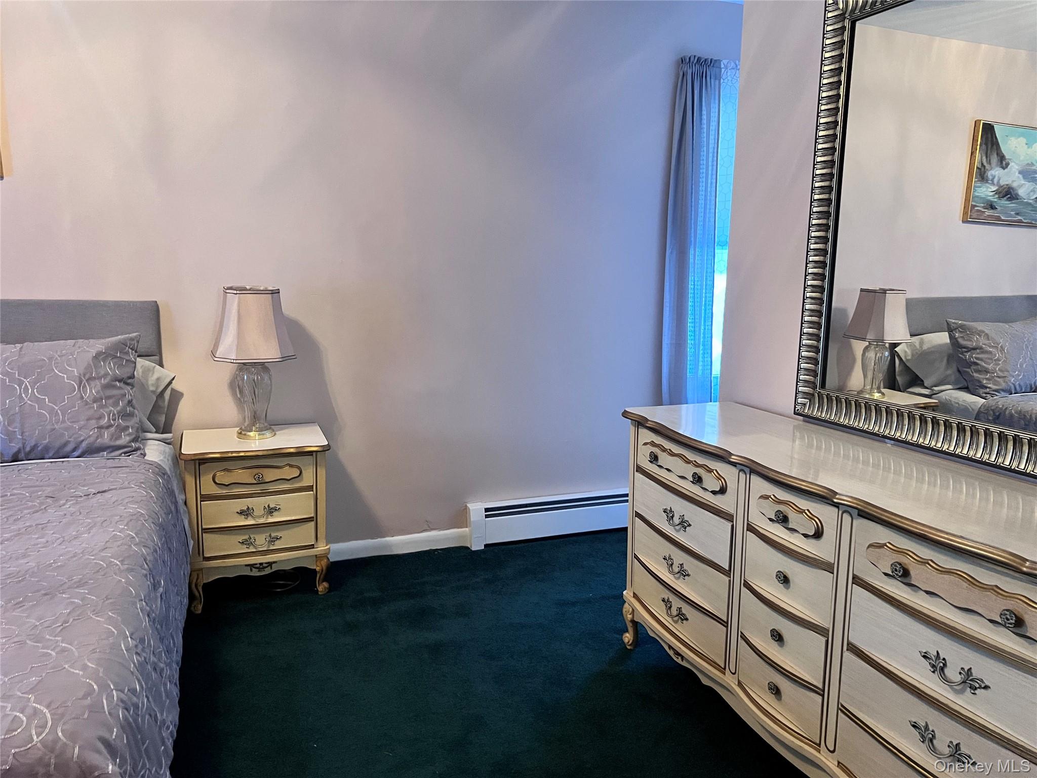 13 Herlings Road Wurtsboro, NY 12790 - Photo 10 of 37 a view of bedroom with furniture and wooden floor