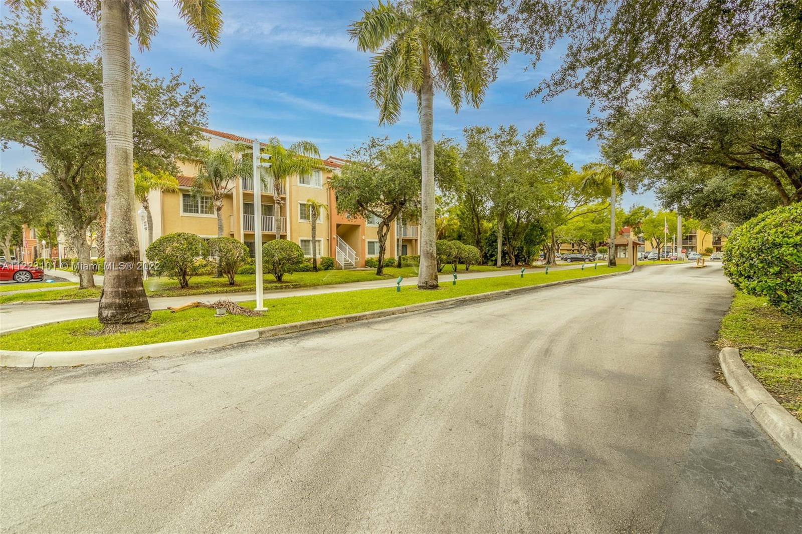 3490 Foxcroft Road, Unit B103 Miramar, FL 33025 - Photo 2 of 37 a view of a playground with basketball court