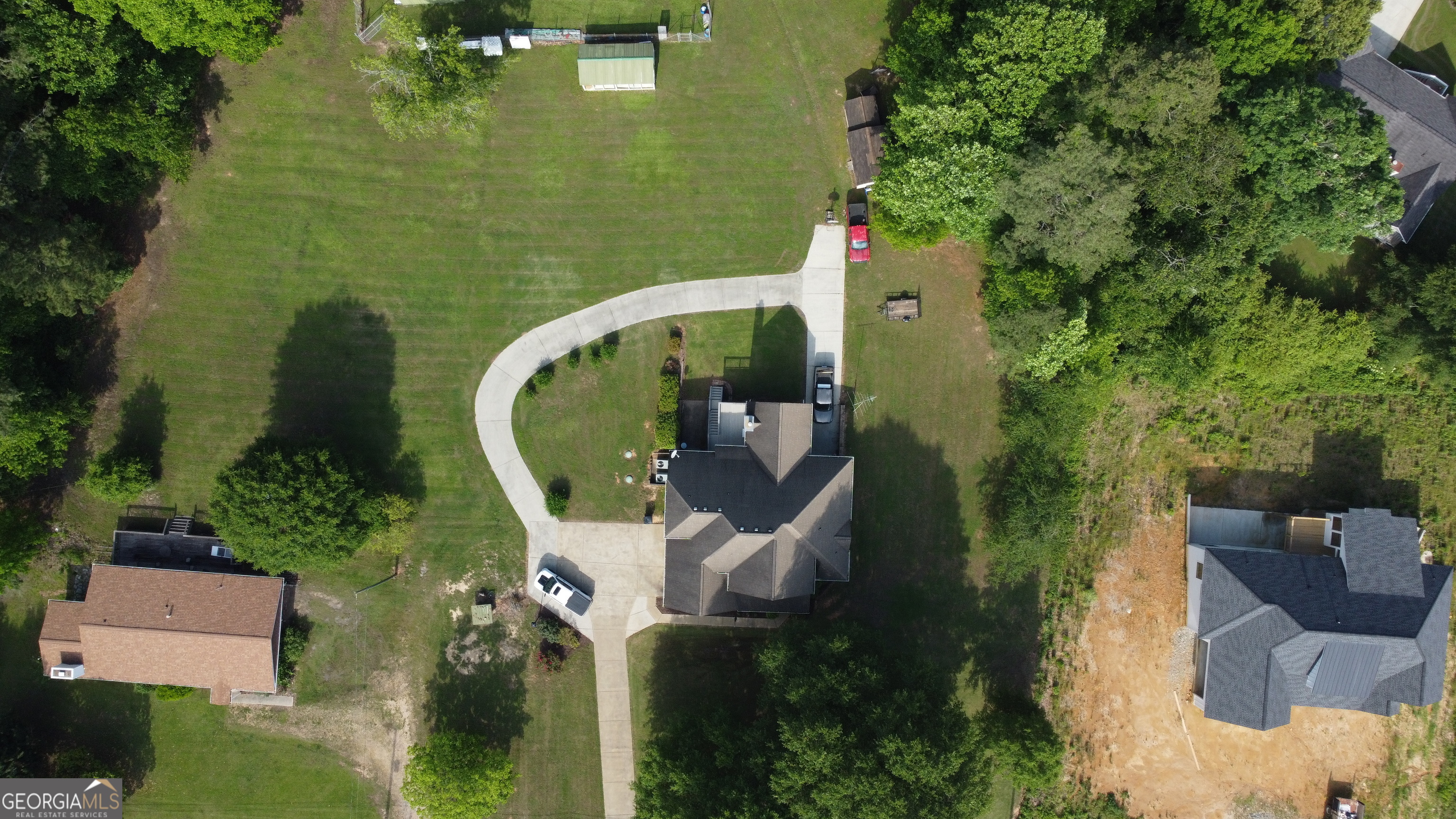 3487 Kellogg Creek Road Acworth, GA 30102 - Photo 11 of 16 an aerial view of a house with outdoor space and a lake view