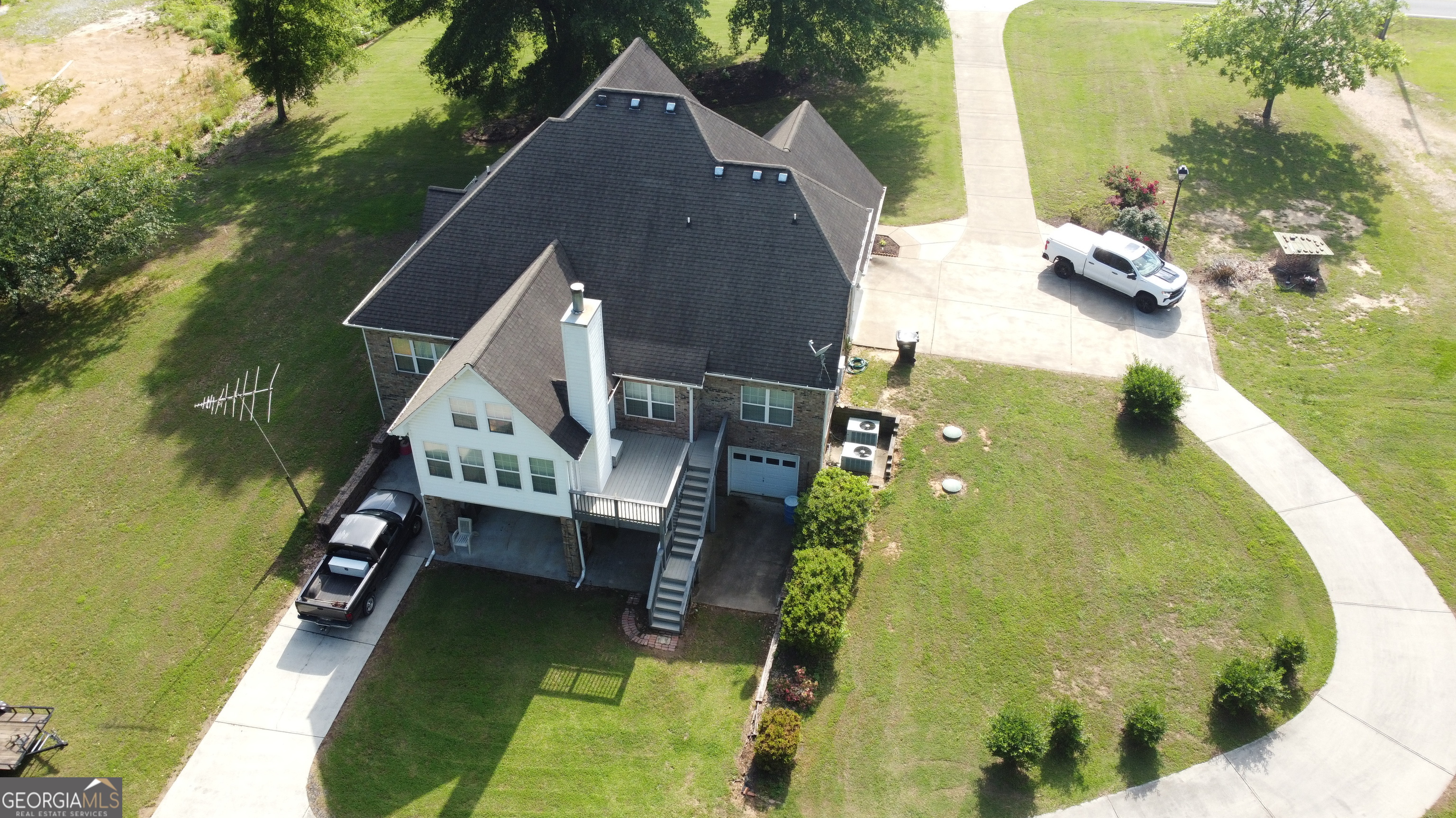 3487 Kellogg Creek Road Acworth, GA 30102 - Photo 12 of 16 a view of a house with a swimming pool