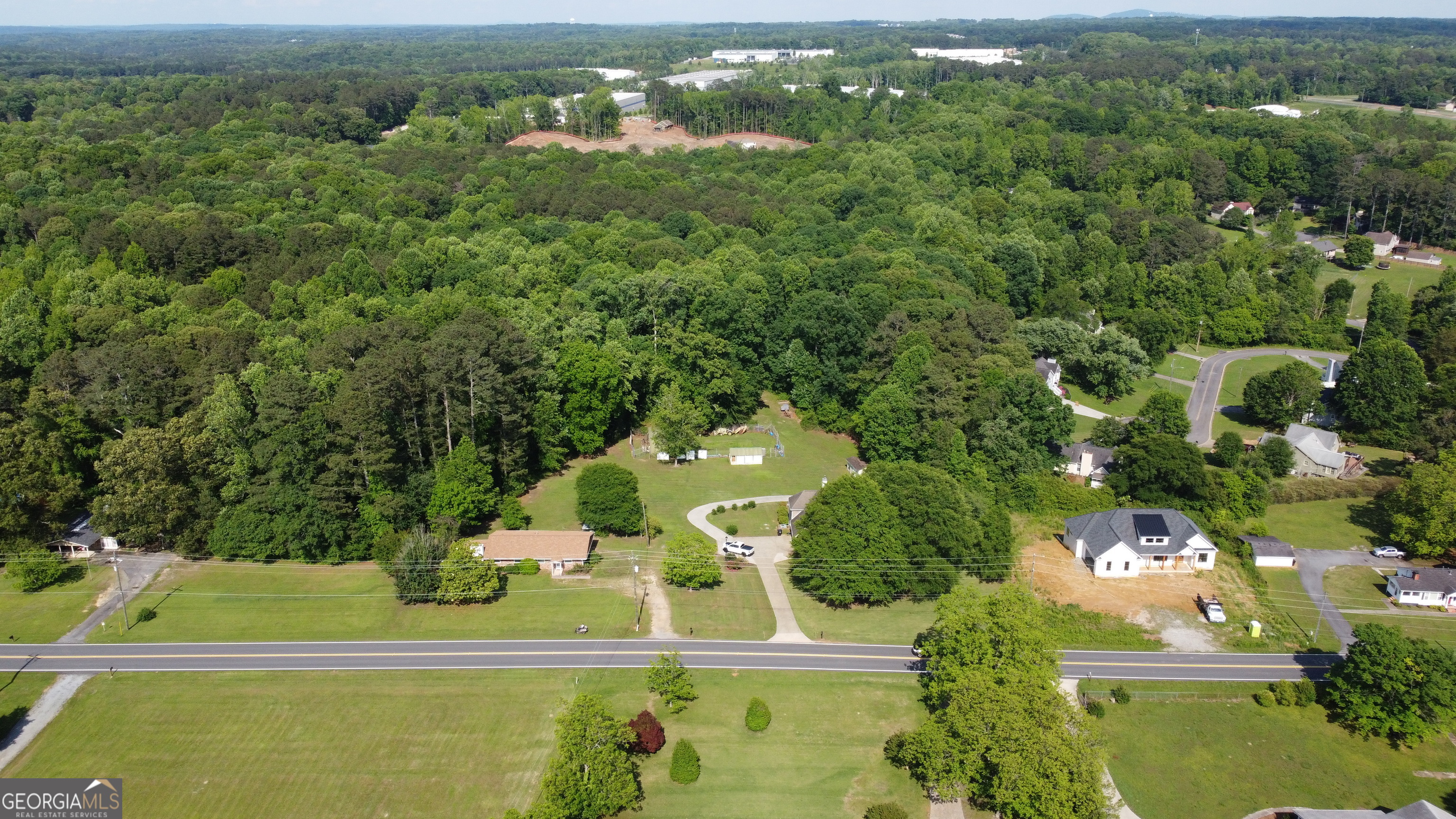 3487 Kellogg Creek Road Acworth, GA 30102 - Photo 4 of 16 an aerial view of a residential houses with outdoor space and street view