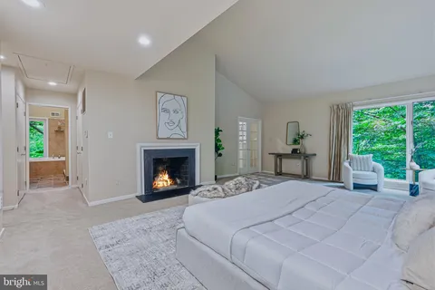 a view of empty room with ceiling fan