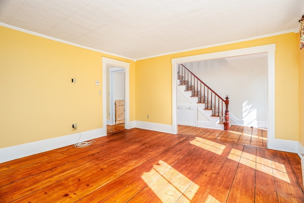 5 River Styx Road Ashburnham, MA 01430 - Photo 17 of 36 a view of an empty room with wooden floor