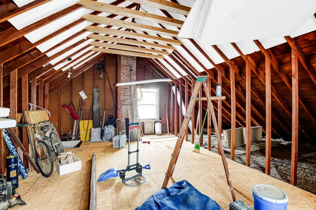 a view of an chairs and table in a patio