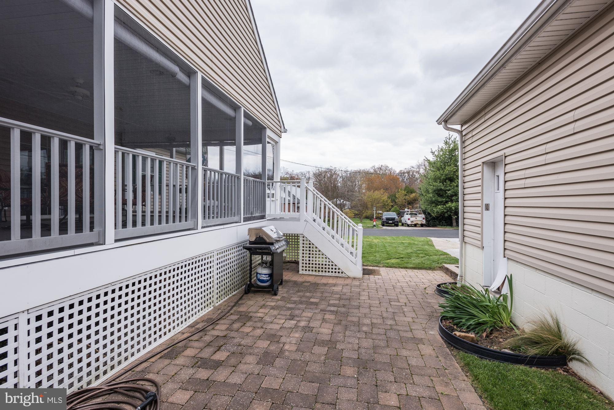 306 Homewood Road Linthicum, MD 21090 - Photo 29 of 32 a view of a house with a yard
