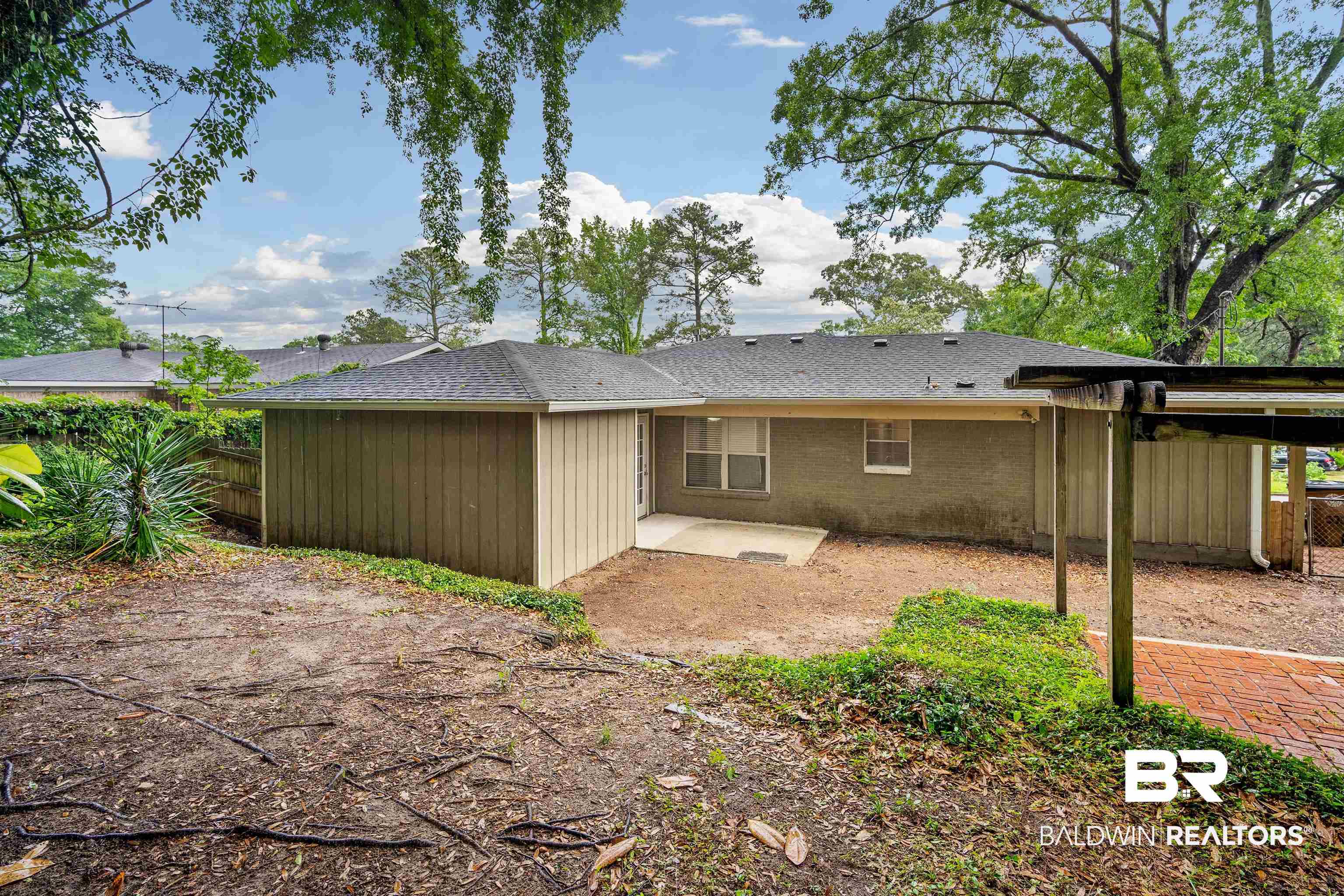 570 Markham Drive Mobile, AL 36609 - Photo 24 of 25 Back of house with fence and a patio