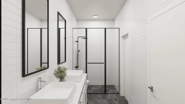a bathroom with a shower and a sink