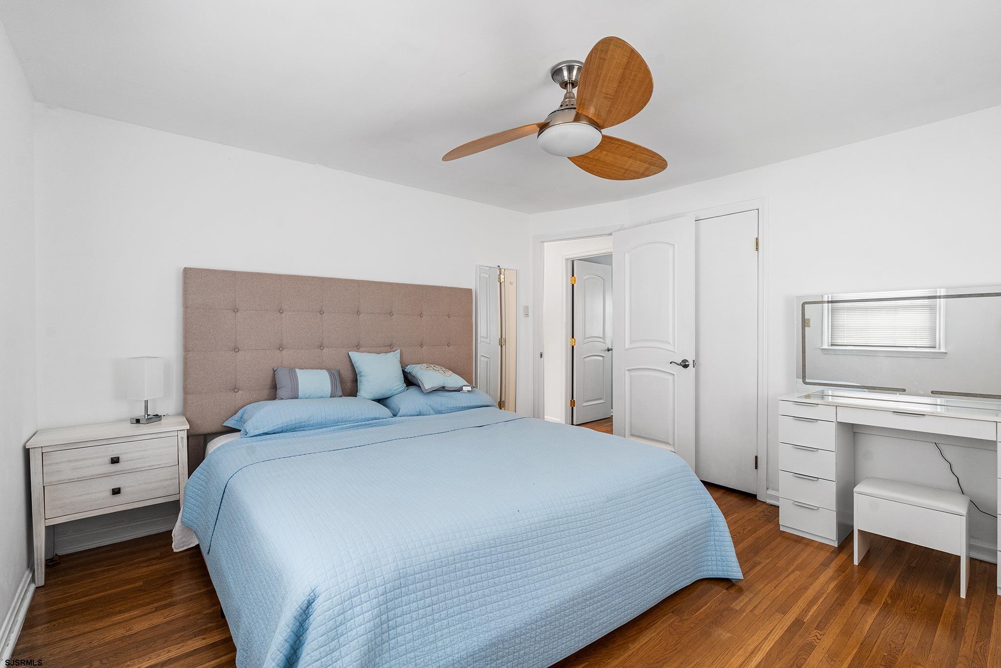 128 Devon Road Somers Point, NJ 08244 - Photo 29 of 40 a bedroom with a bed and a window