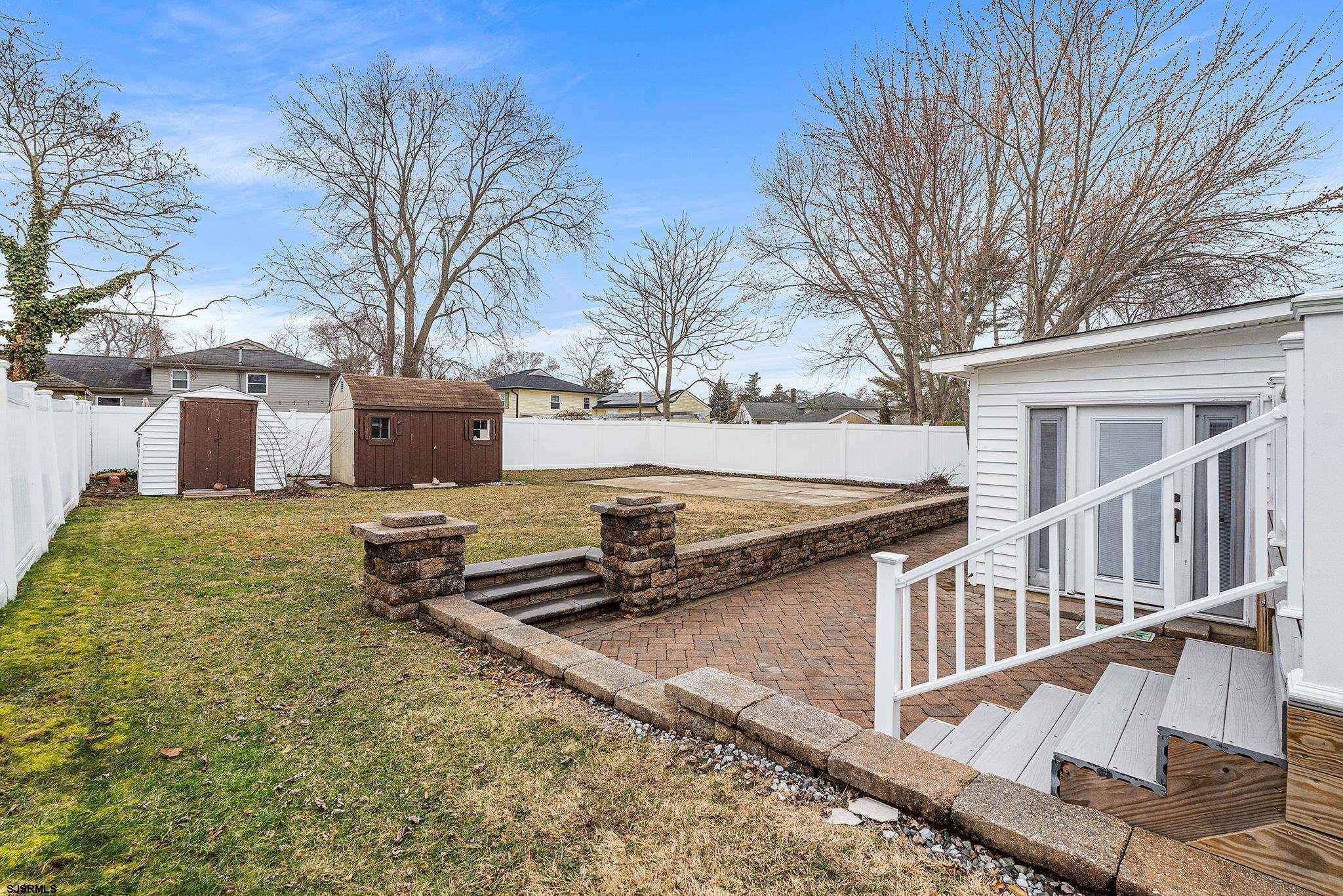 128 Devon Road Somers Point, NJ 08244 - Photo 32 of 40 a view of a house with backyard