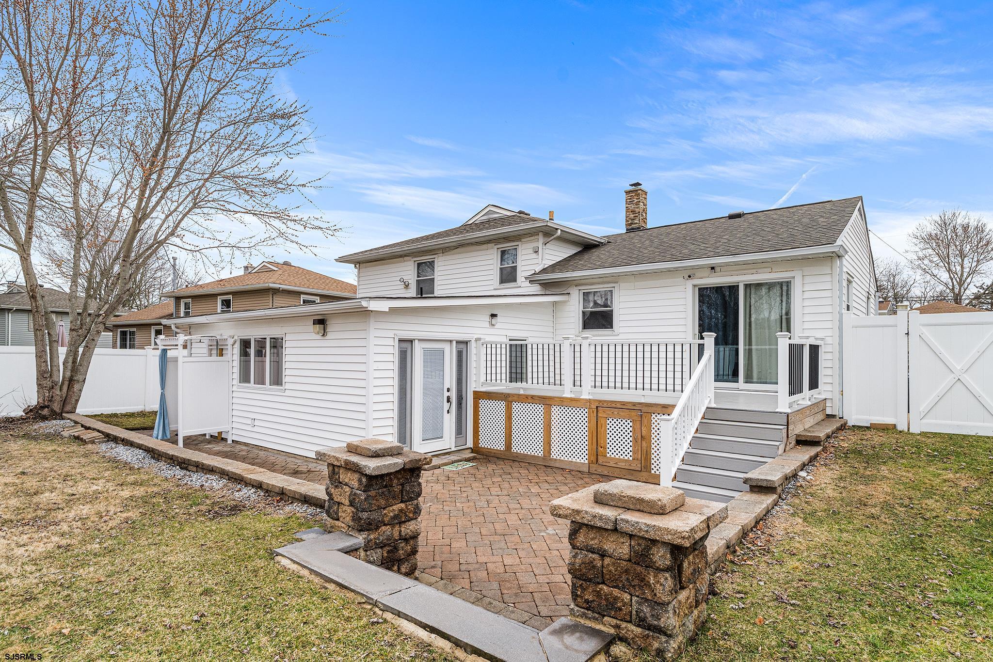 128 Devon Road Somers Point, NJ 08244 - Photo 33 of 40 front view of a house with a chairs