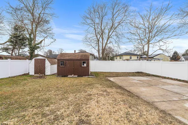 a view of yard with large tree