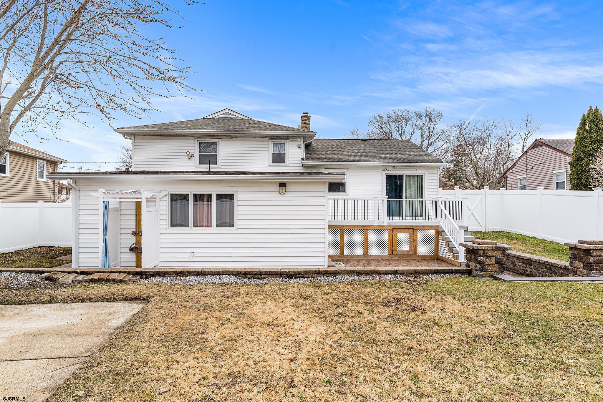 128 Devon Road Somers Point, NJ 08244 - Photo 36 of 40 a view of a house with a yard