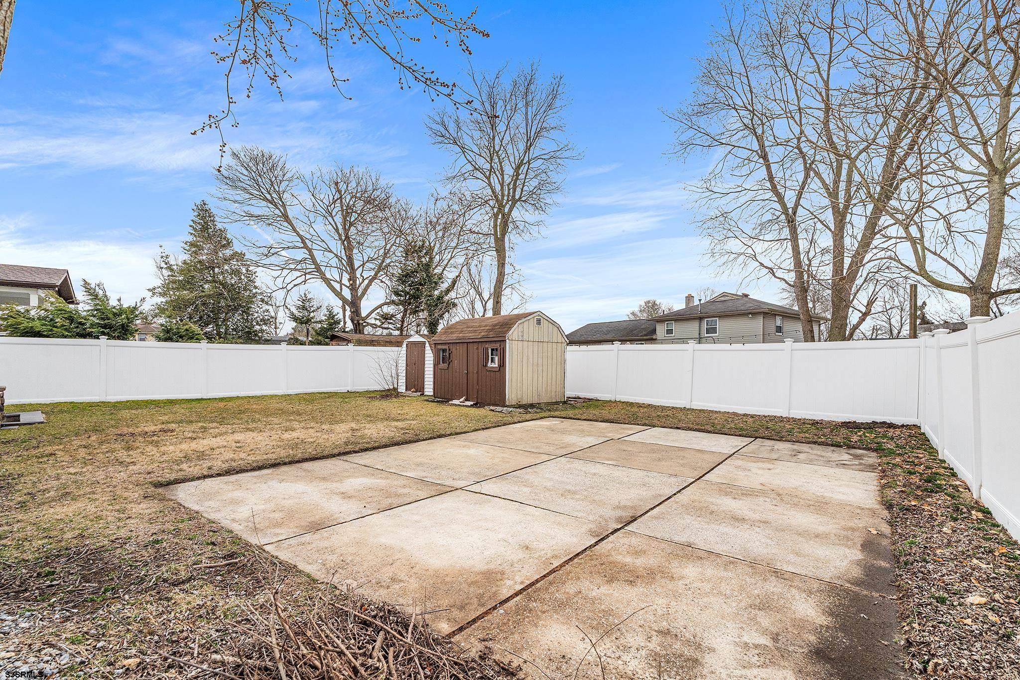 128 Devon Road Somers Point, NJ 08244 - Photo 38 of 40 a view of a yard with trees