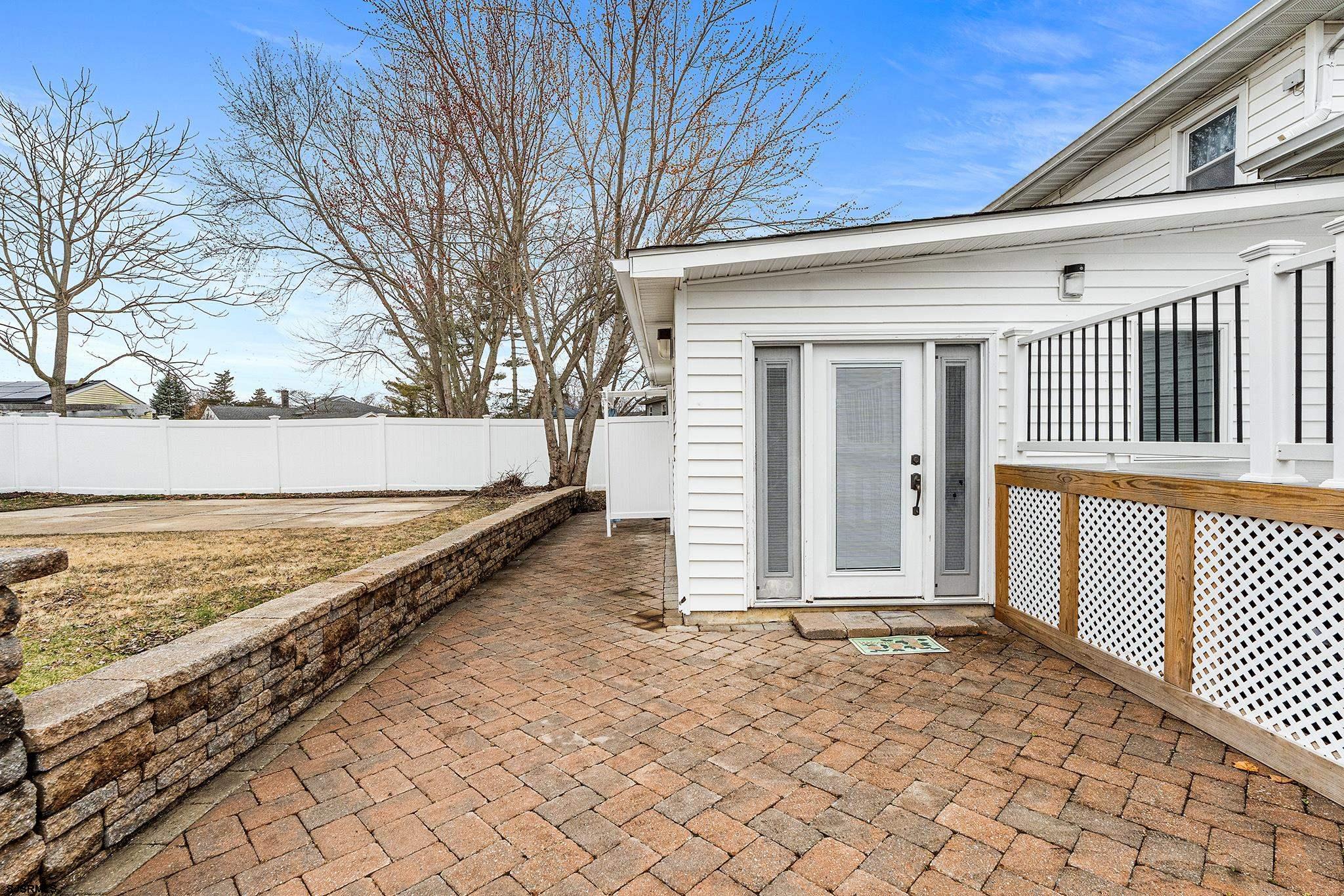 128 Devon Road Somers Point, NJ 08244 - Photo 39 of 40 a view of a backyard with wooden fence