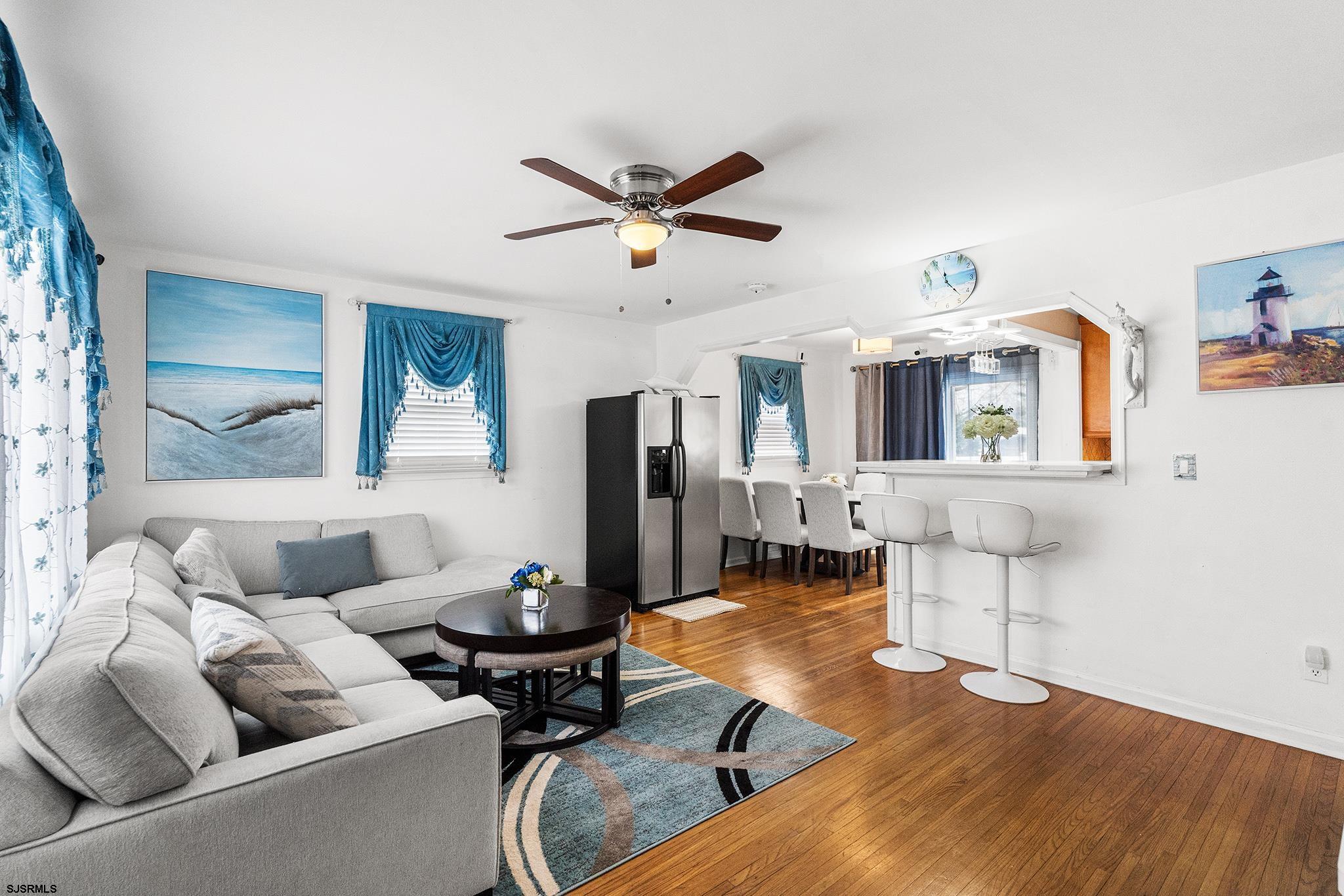 128 Devon Road Somers Point, NJ 08244 - Photo 4 of 40 a living room with furniture and wooden floor