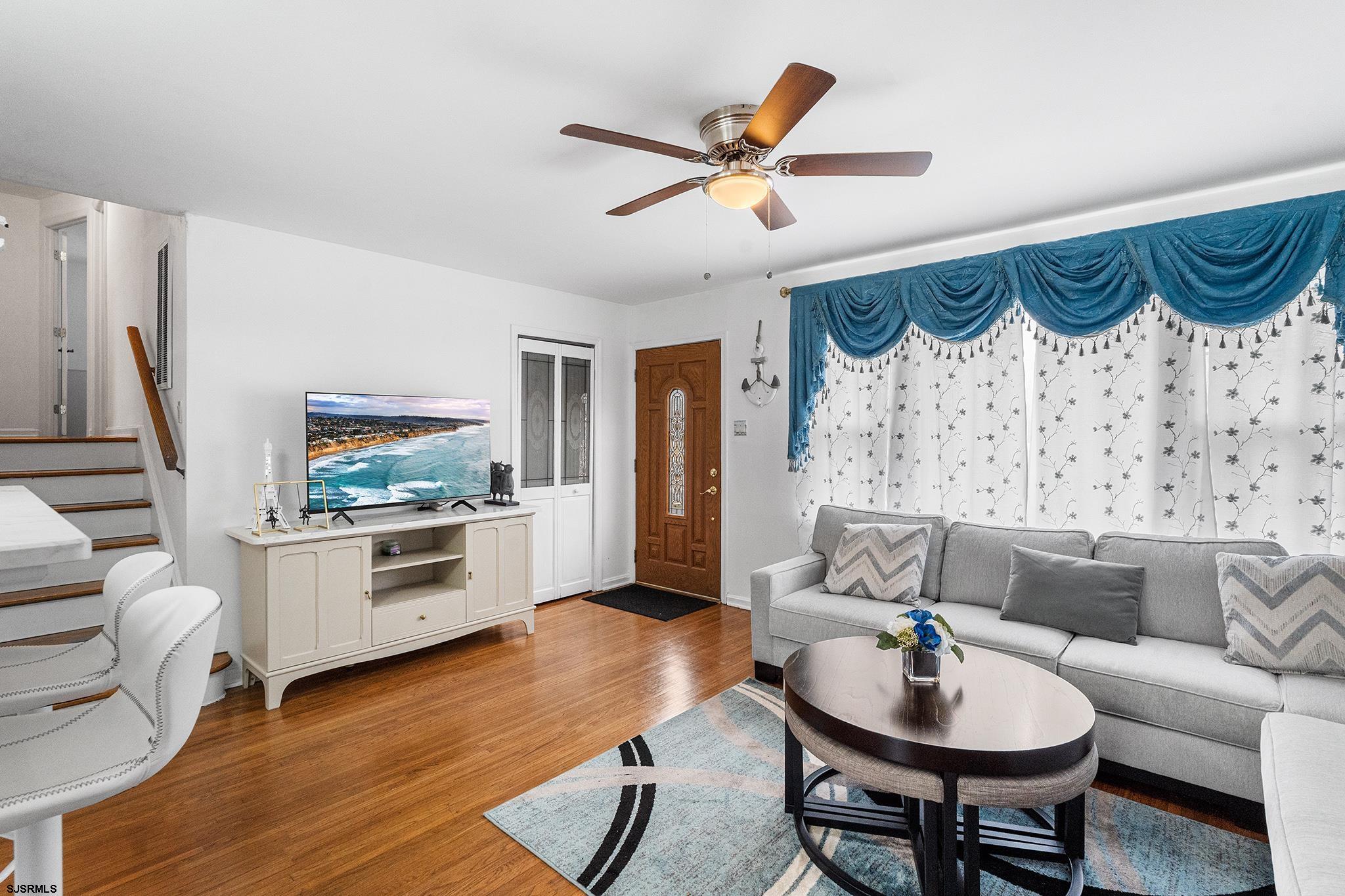 128 Devon Road Somers Point, NJ 08244 - Photo 5 of 40 a living room with furniture and a wooden floor
