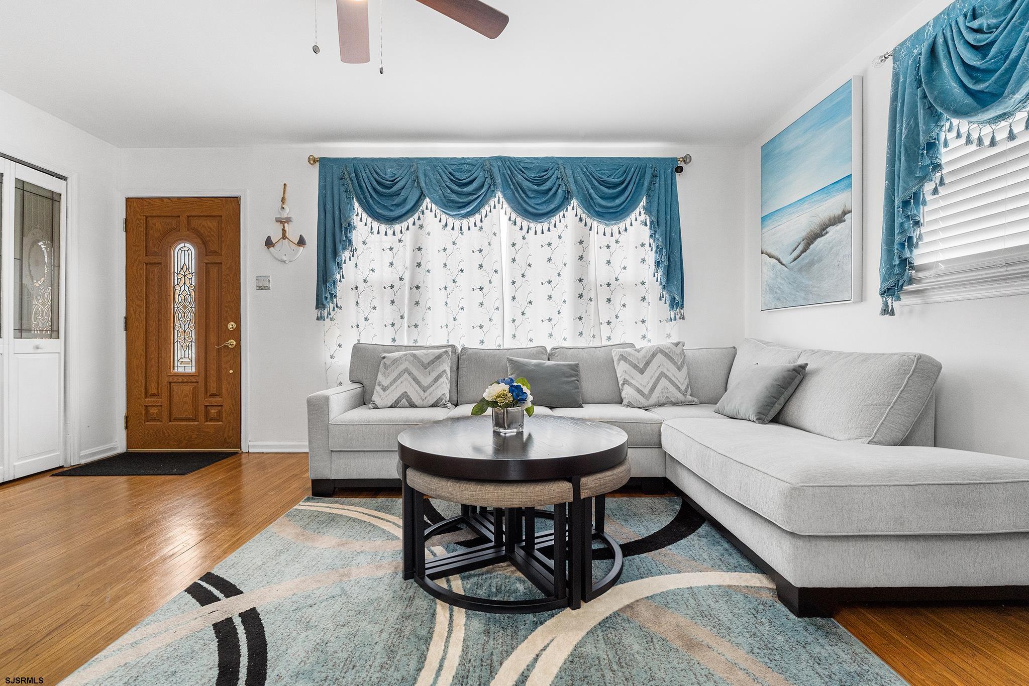 128 Devon Road Somers Point, NJ 08244 - Photo 6 of 40 a living room with furniture and a wooden floor