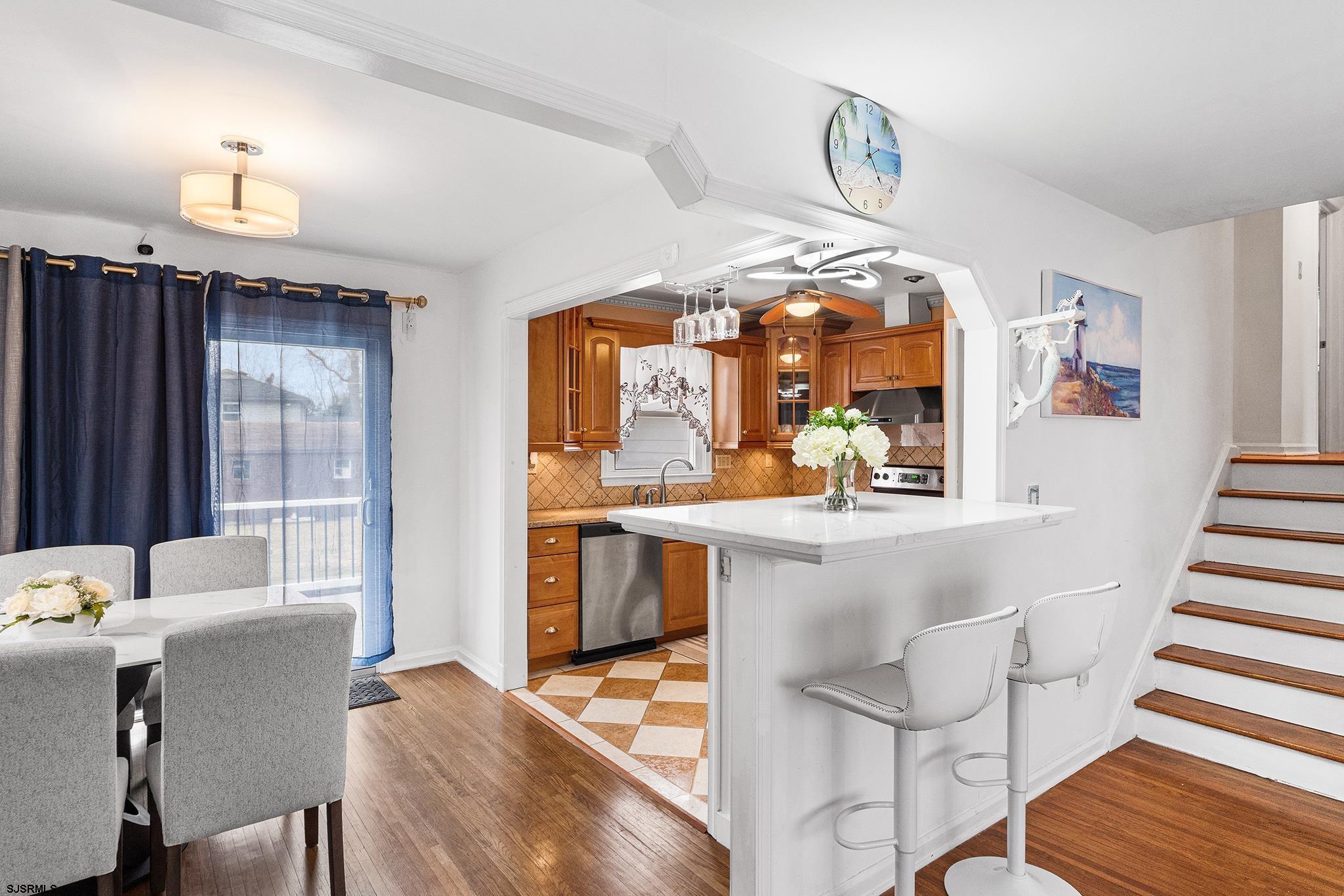 128 Devon Road Somers Point, NJ 08244 - Photo 7 of 40 a dining room with furniture and window