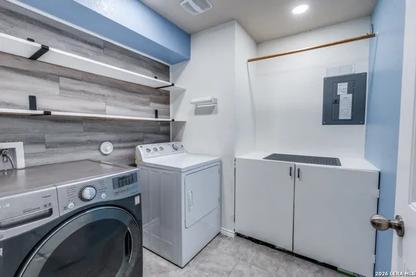 a utility room with dryer and washer