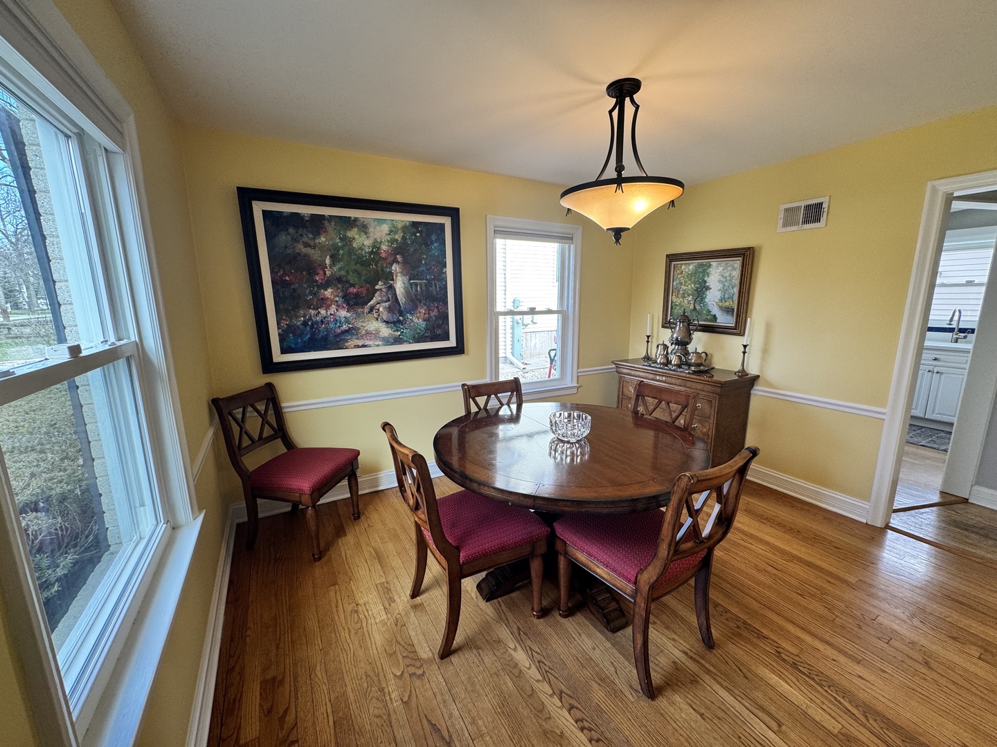 1039 Springfield Avenue Deerfield, IL 60015 - Photo 3 of 5 a view of a dining room with furniture window and wooden floor