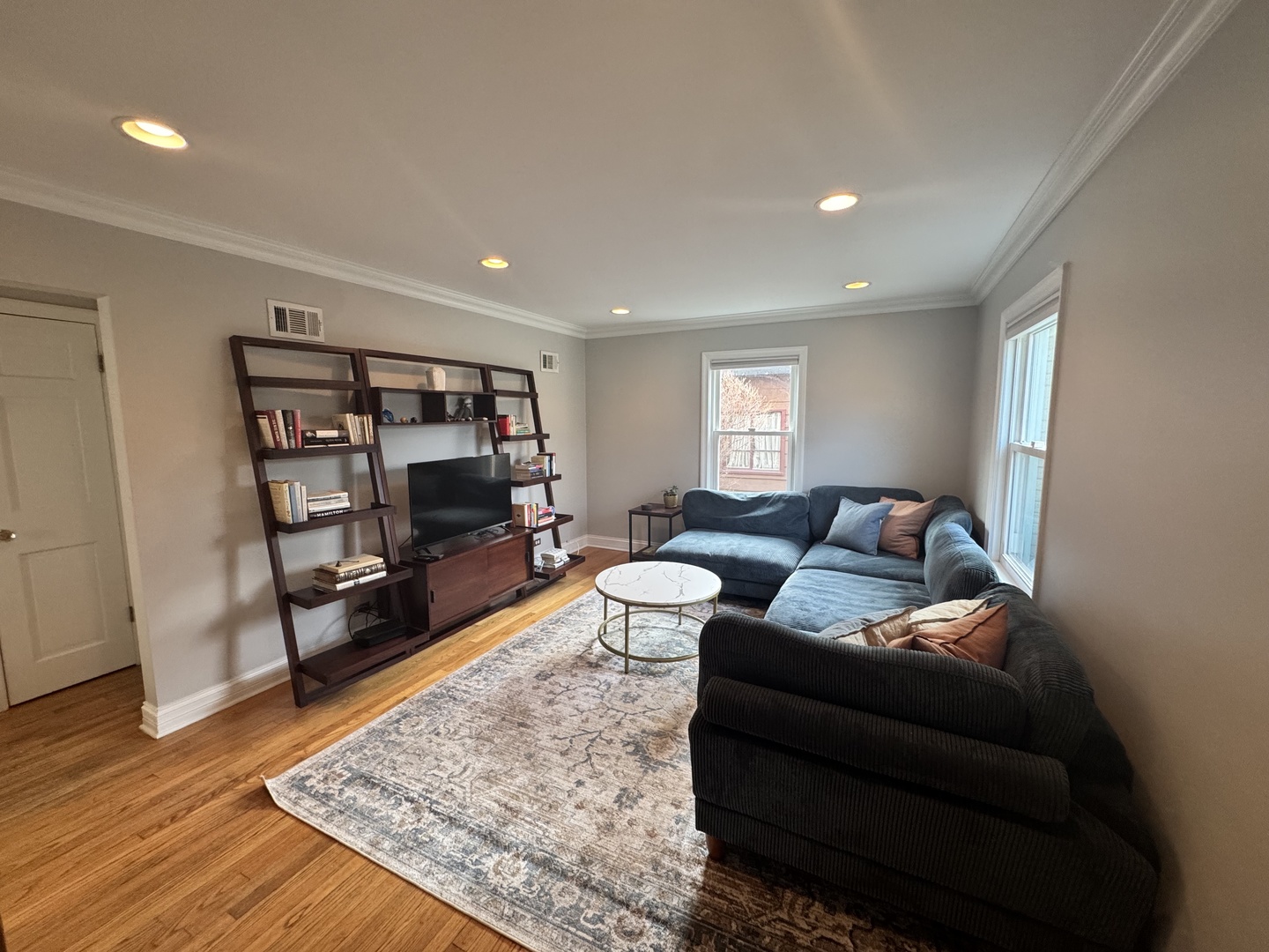 1039 Springfield Avenue Deerfield, IL 60015 - Photo 4 of 5 a living room with furniture and a wooden floor