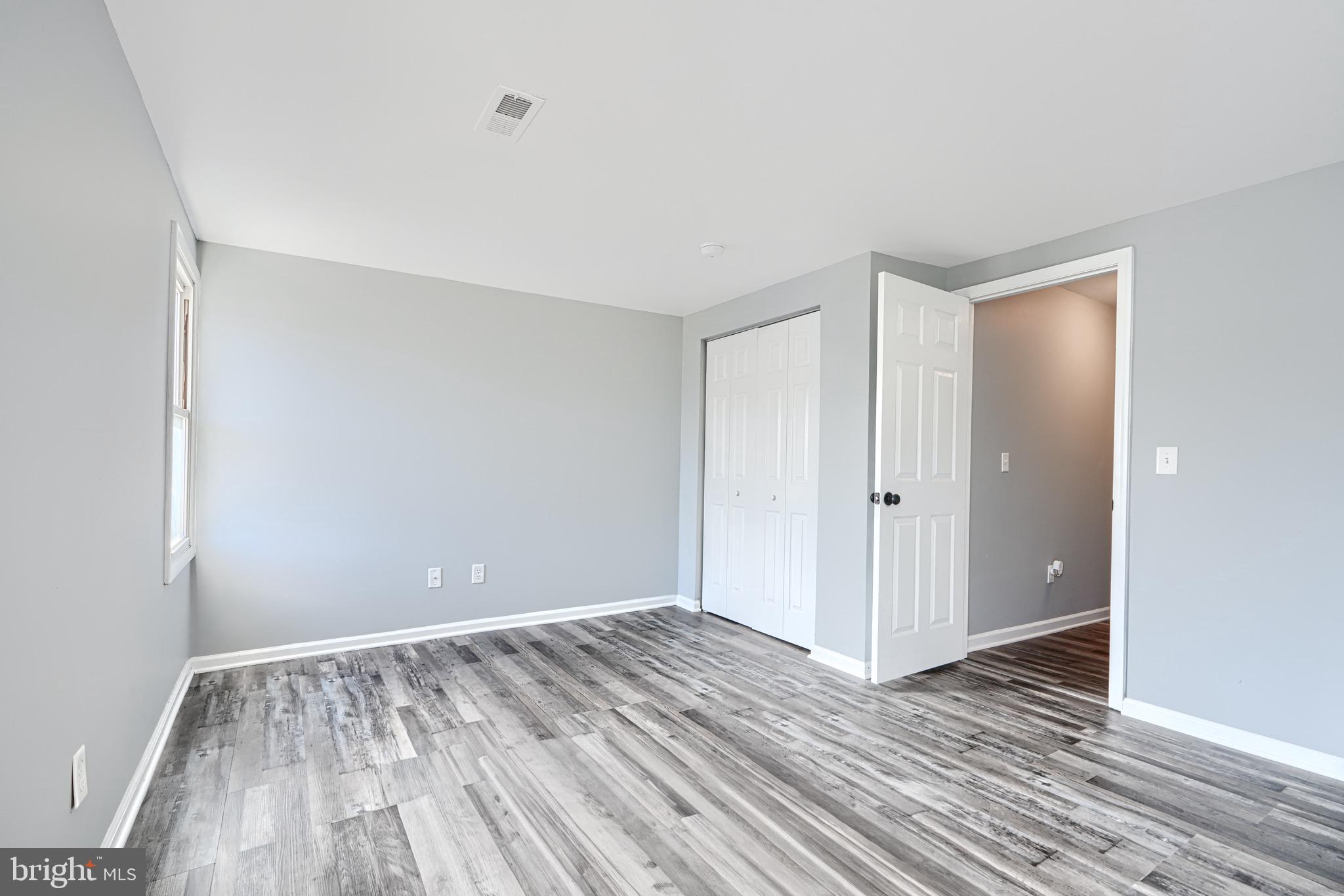 213 Colgate Avenue Baltimore, MD 21222 - Photo 16 of 24 a view of room with wooden floor