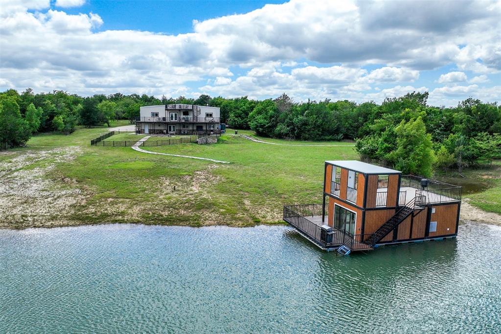 2129 Hcr 3322 Loop Hubbard, TX 76648 - Photo 6 of 38 3 Acre Lake with custom built covered indoor-outdoor fishing pier on the water!