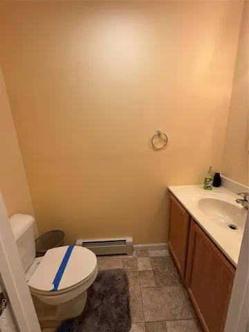 a bathroom with a sink and a toilet