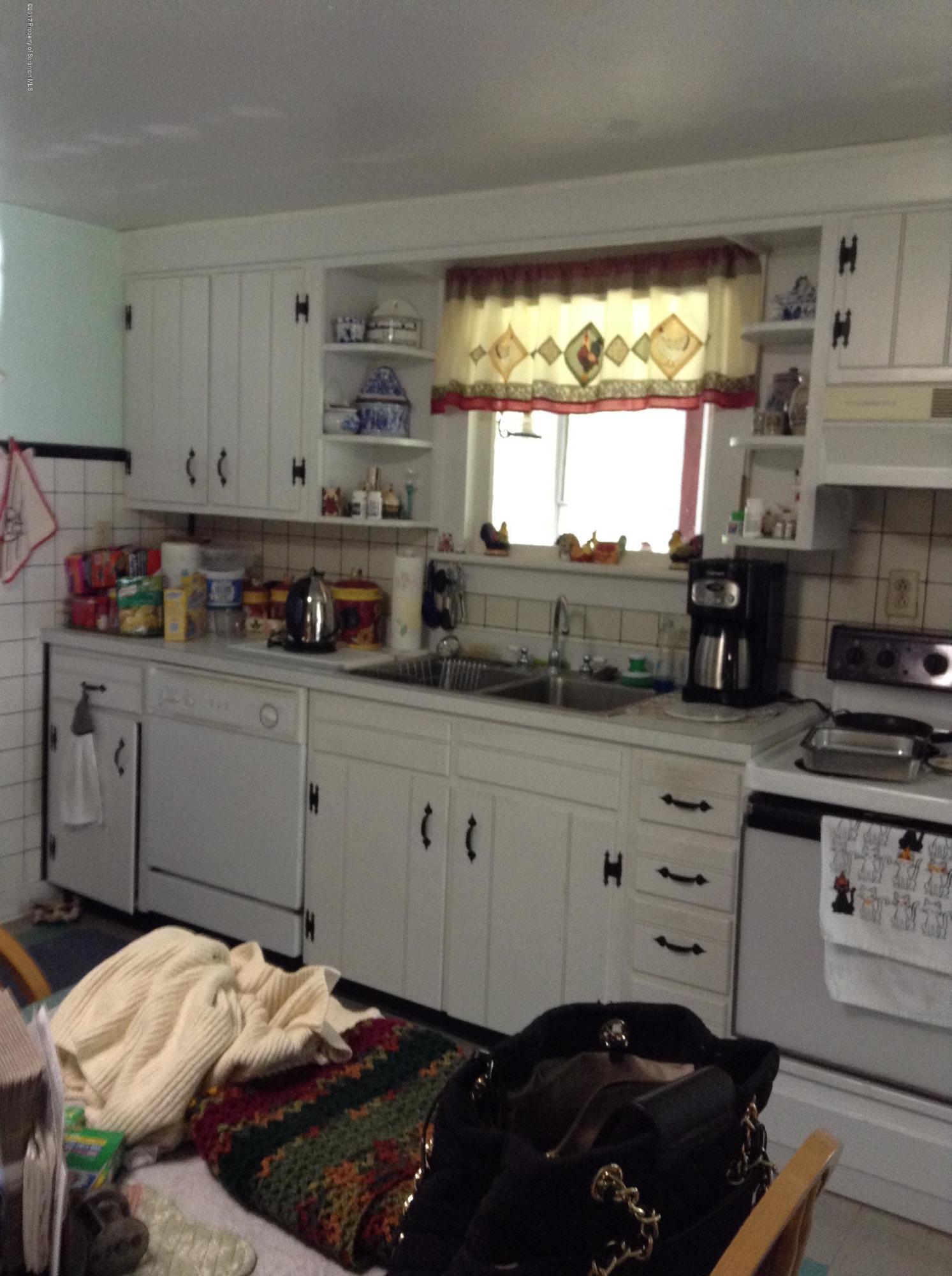 2714 Hunsinger Road Hallstead, PA 18822 - Photo 3 of 30 a kitchen with a window a sink and a window