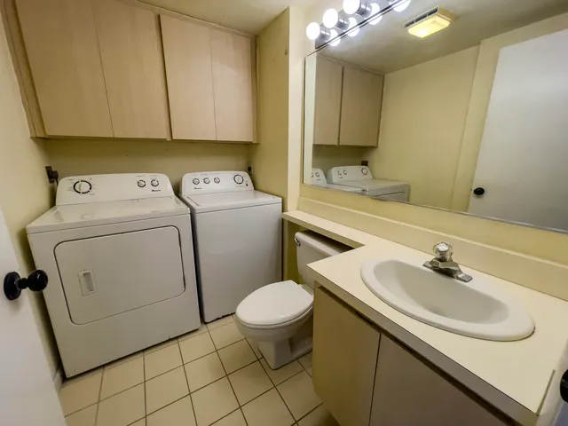 a view of kitchen with wooden floor