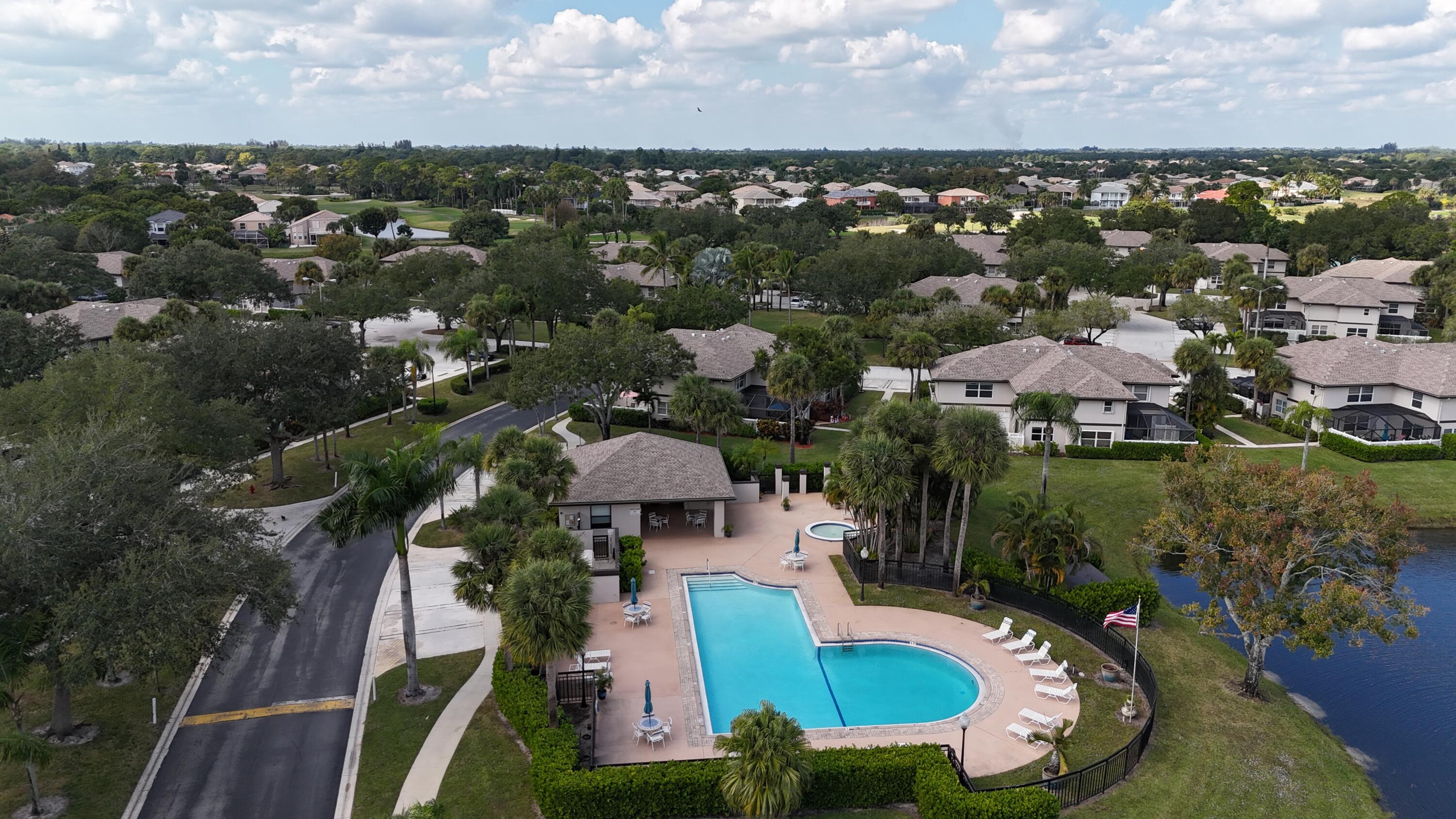 27 Clinton Court, Unit D Royal Palm Beach, FL 33411 - Photo 21 of 32 an aerial view of multiple house