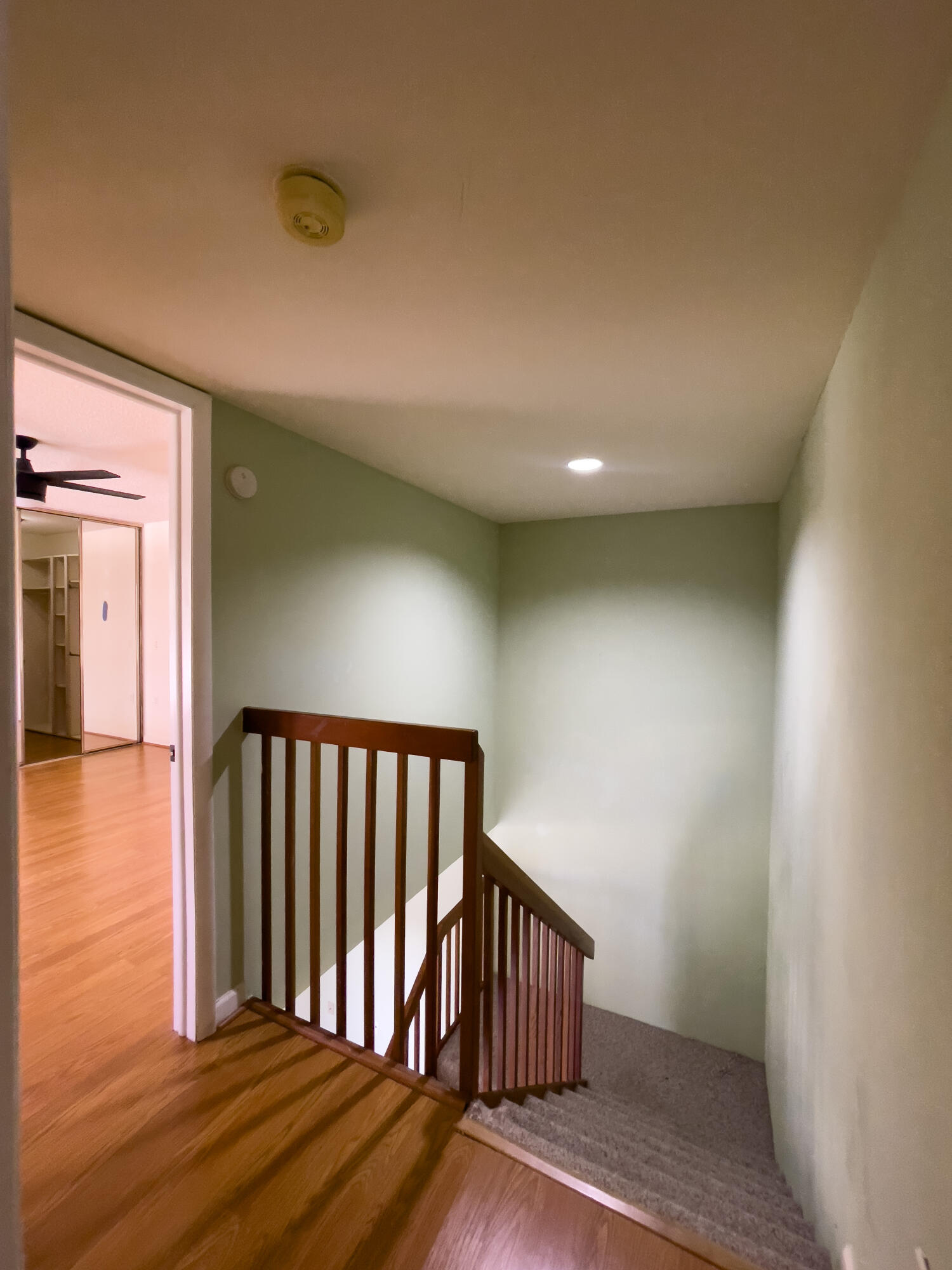 27 Clinton Court, Unit D Royal Palm Beach, FL 33411 - Photo 31 of 32 a view of hallway with wooden floor