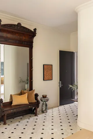 a kitchen with a table and chairs in it