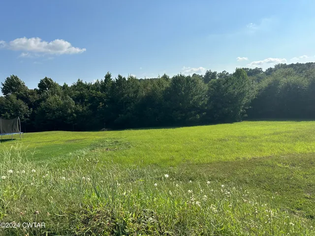 a view of an outdoor space with a lake view