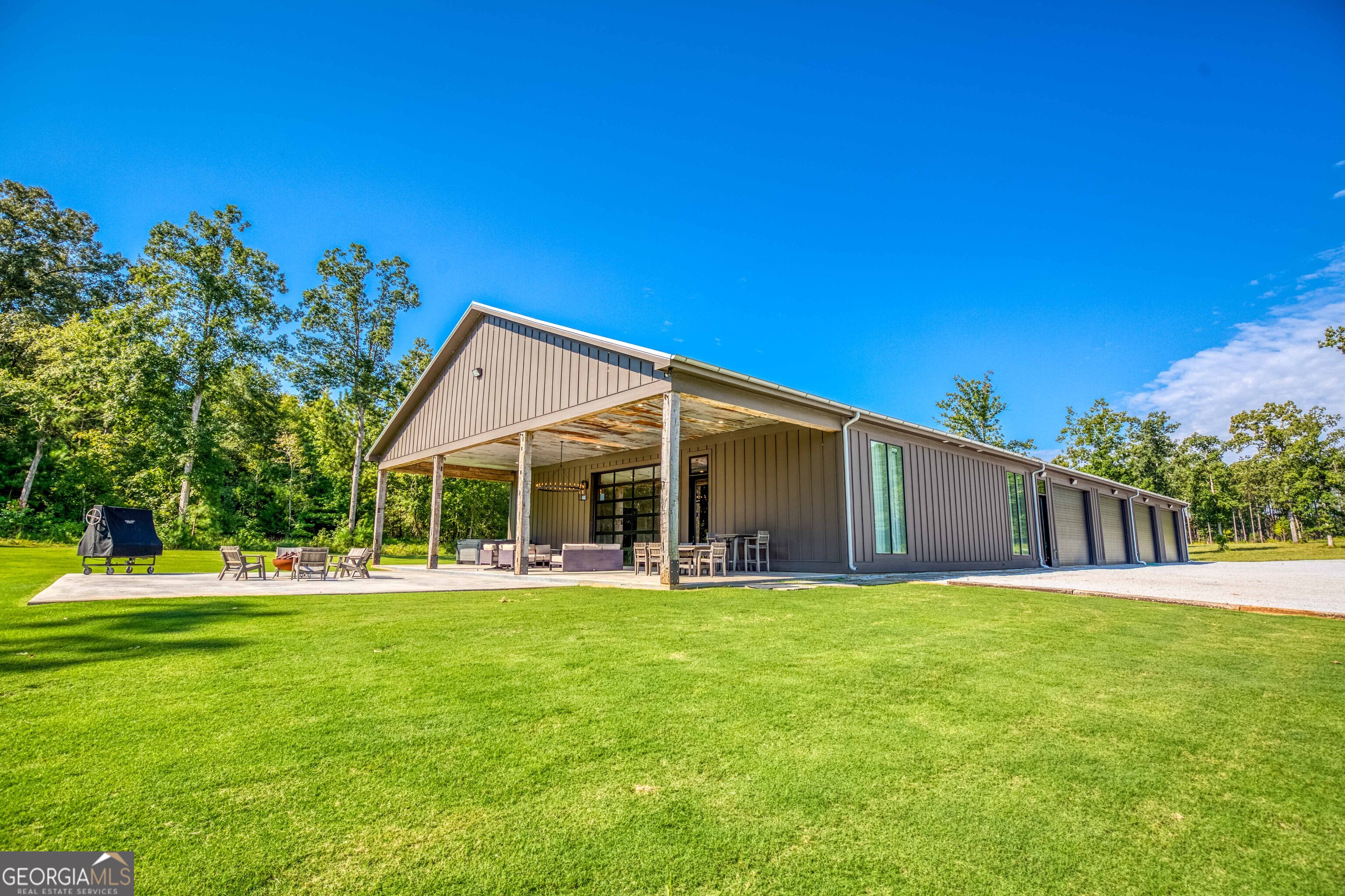 1968 Bobby Brown State Park Road Elberton, GA 30635 - Photo 11 of 97 a view of a house with a yard and sitting area