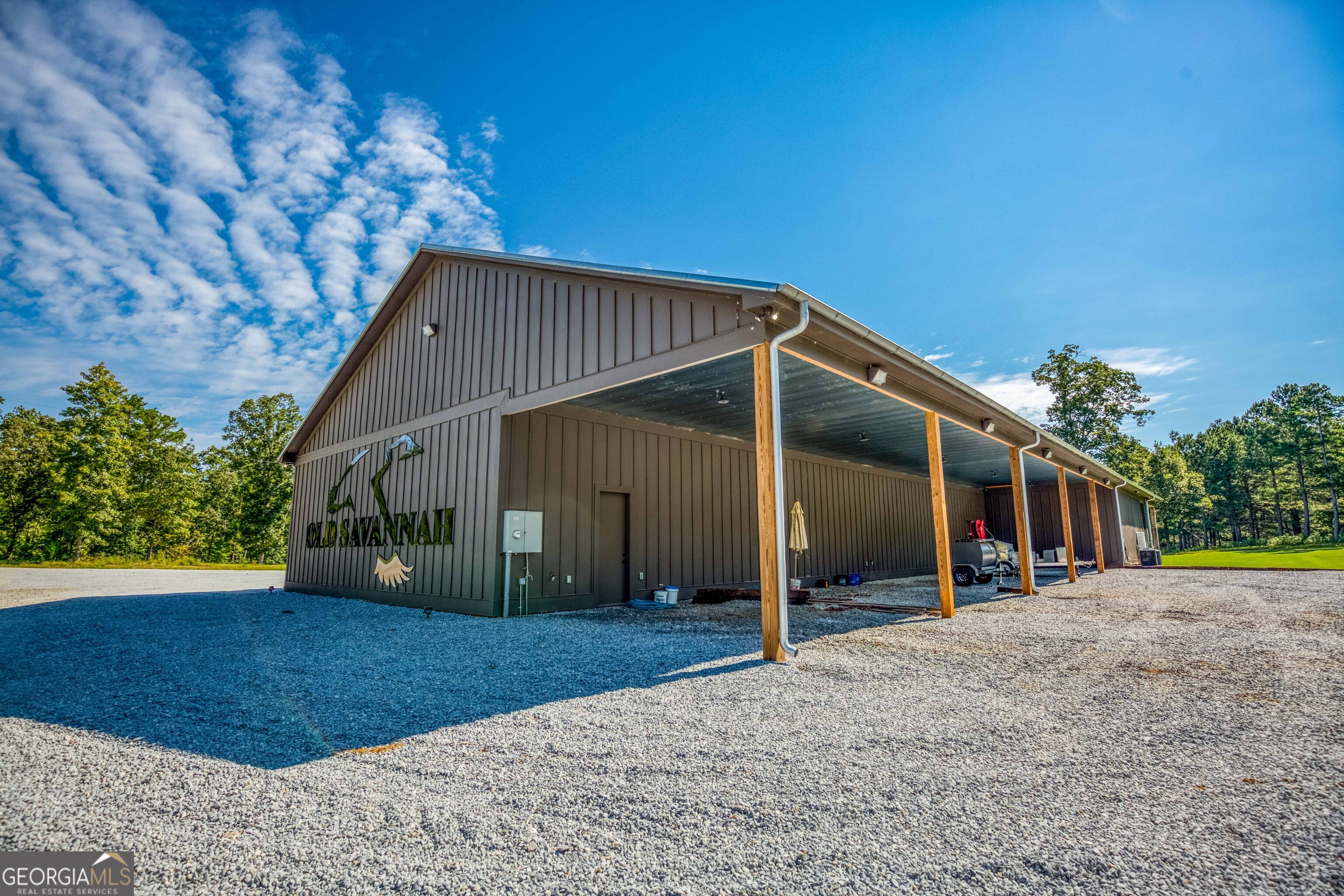 1968 Bobby Brown State Park Road Elberton, GA 30635 - Photo 15 of 97 a view of a house with a yard and potted plants