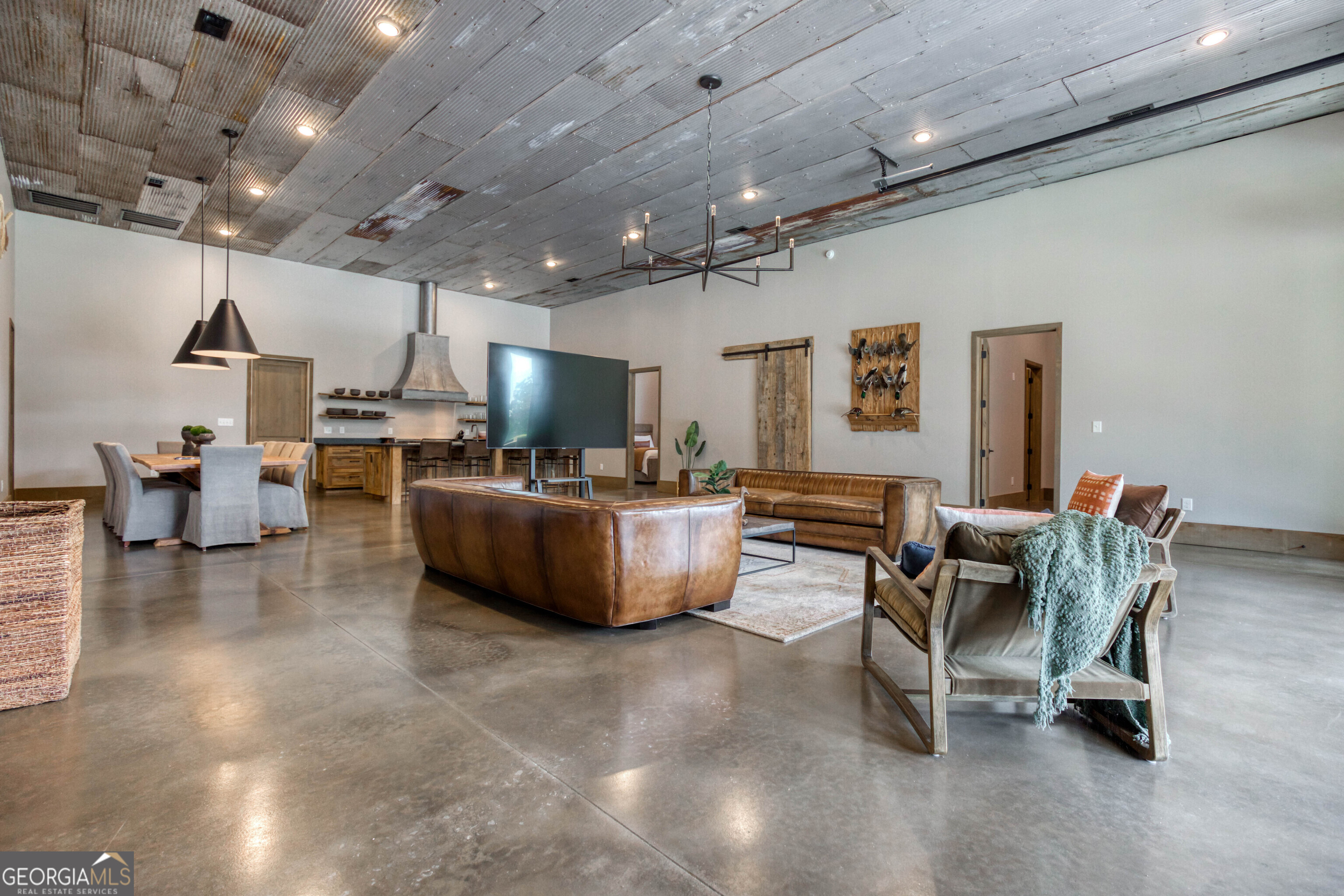 1968 Bobby Brown State Park Road Elberton, GA 30635 - Photo 23 of 97 a living room with furniture and a flat screen tv