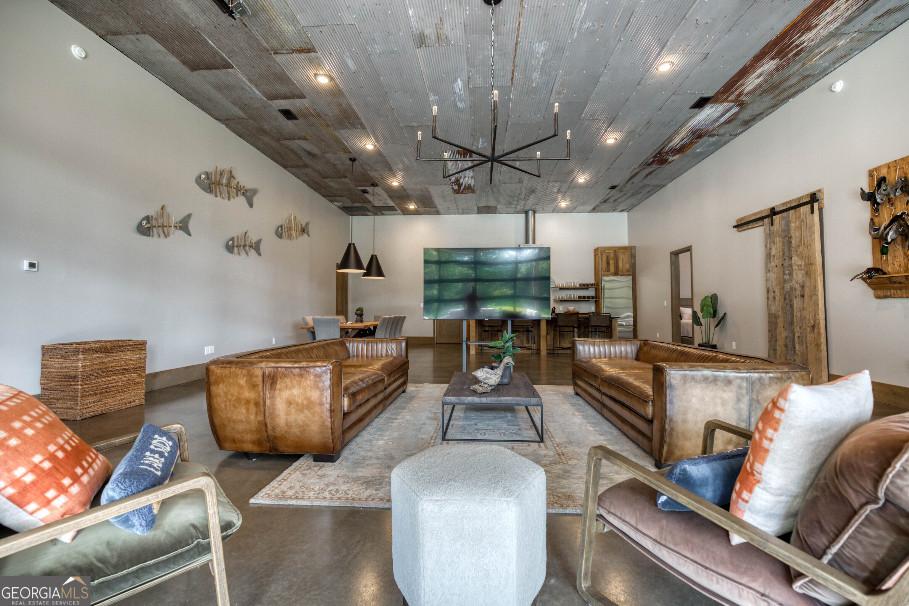 1968 Bobby Brown State Park Road Elberton, GA 30635 - Photo 24 of 97 a living room with furniture and a chandelier