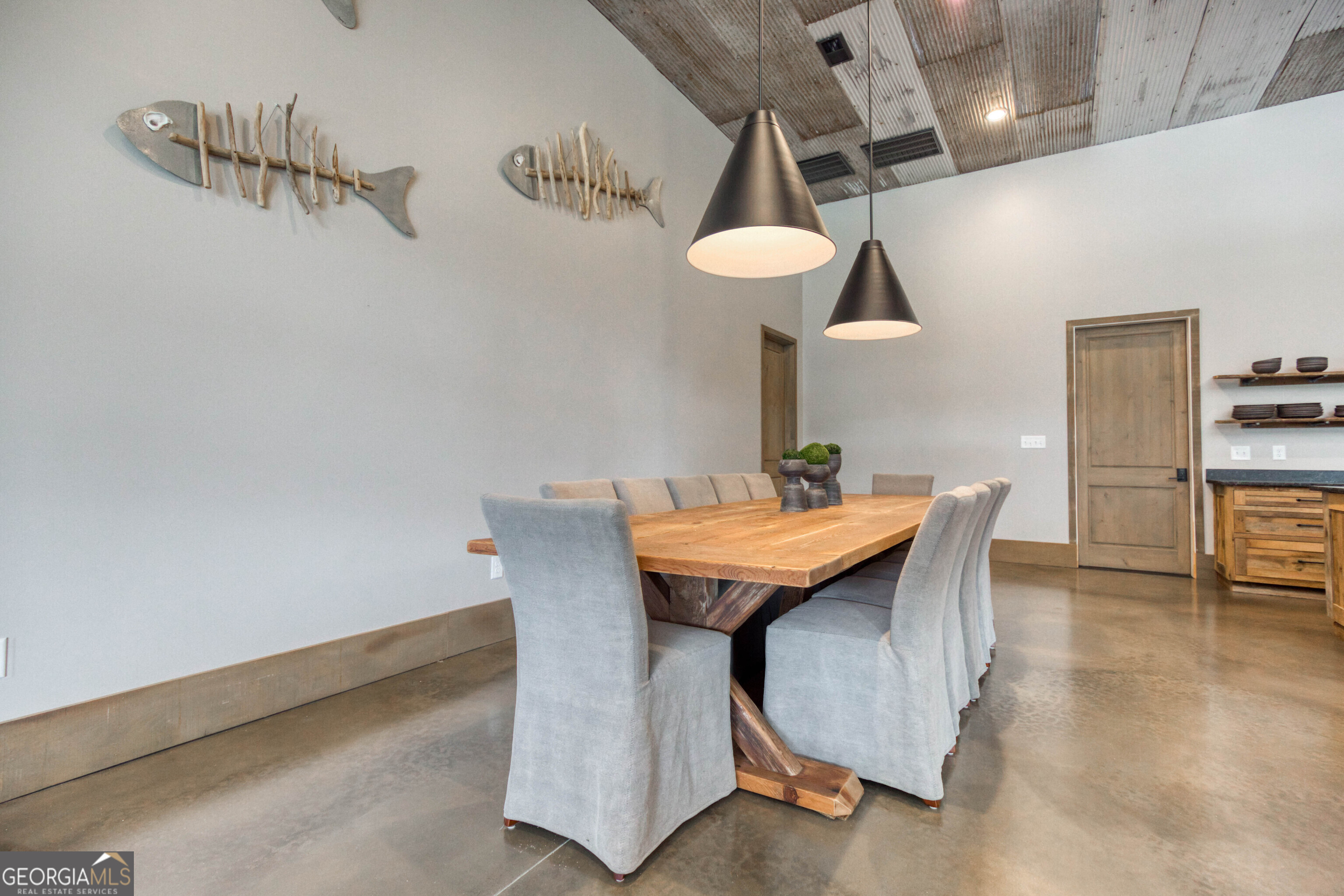 1968 Bobby Brown State Park Road Elberton, GA 30635 - Photo 26 of 97 a view of a dining room with furniture and a chandelier