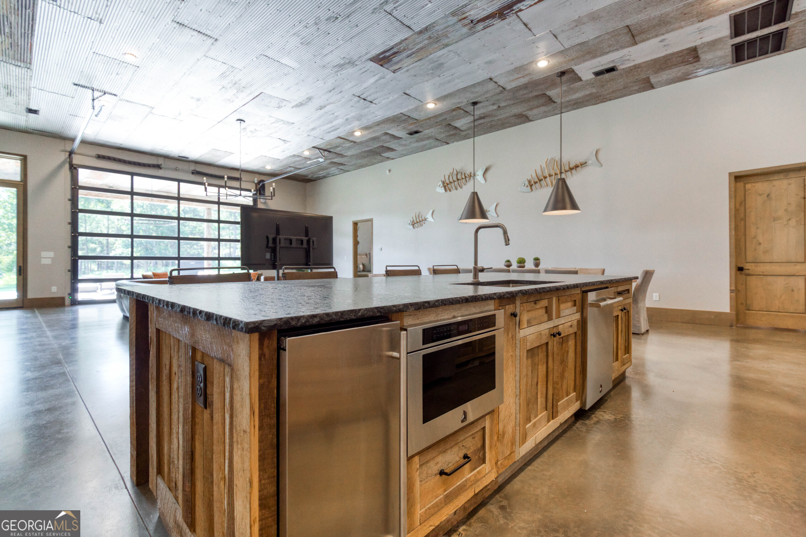 1968 Bobby Brown State Park Road Elberton, GA 30635 - Photo 32 of 97 a kitchen with stainless steel appliances granite countertop a stove and a wooden floors