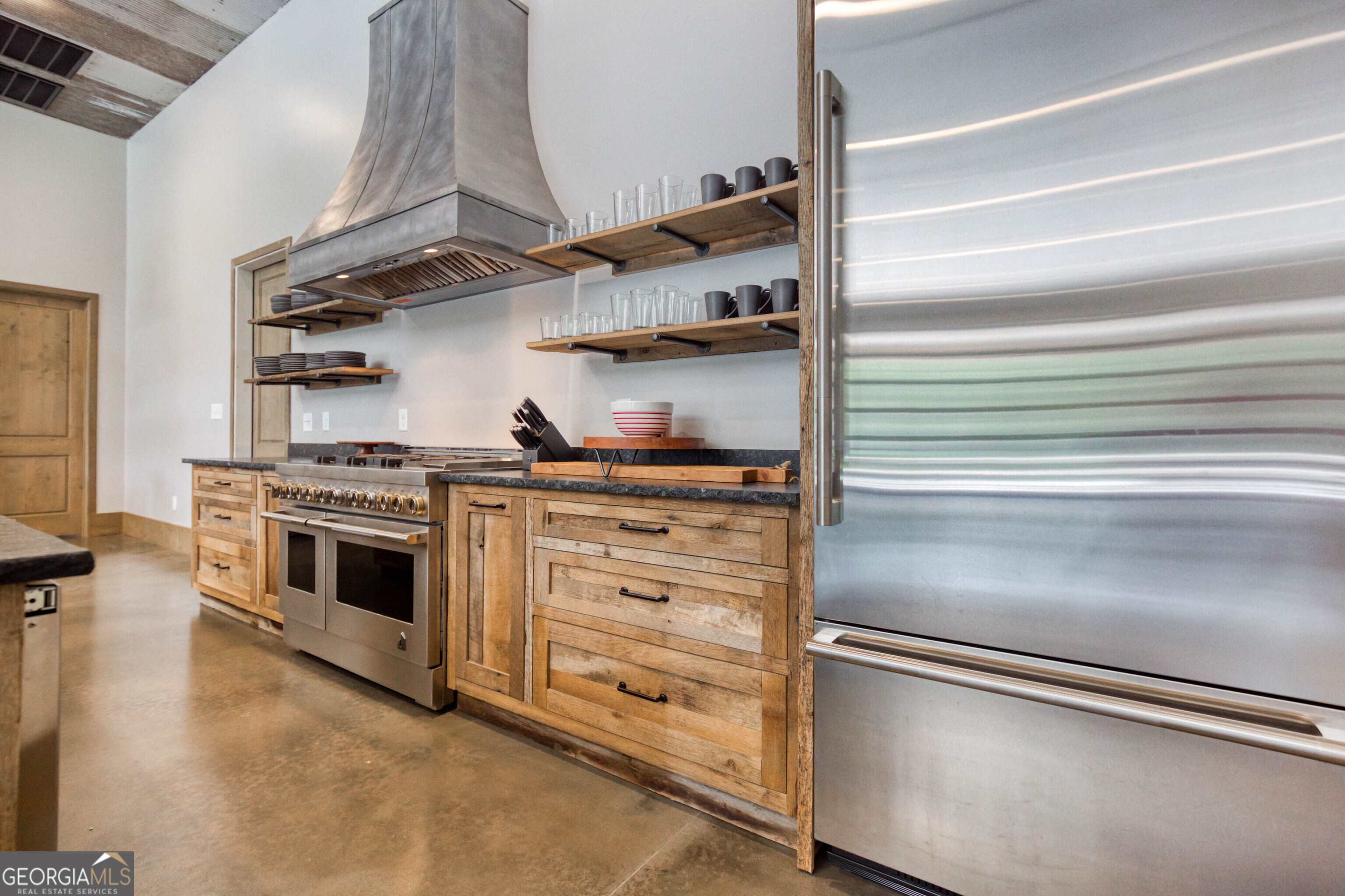 1968 Bobby Brown State Park Road Elberton, GA 30635 - Photo 33 of 97 a kitchen with stainless steel appliances granite countertop a stove and a refrigerator