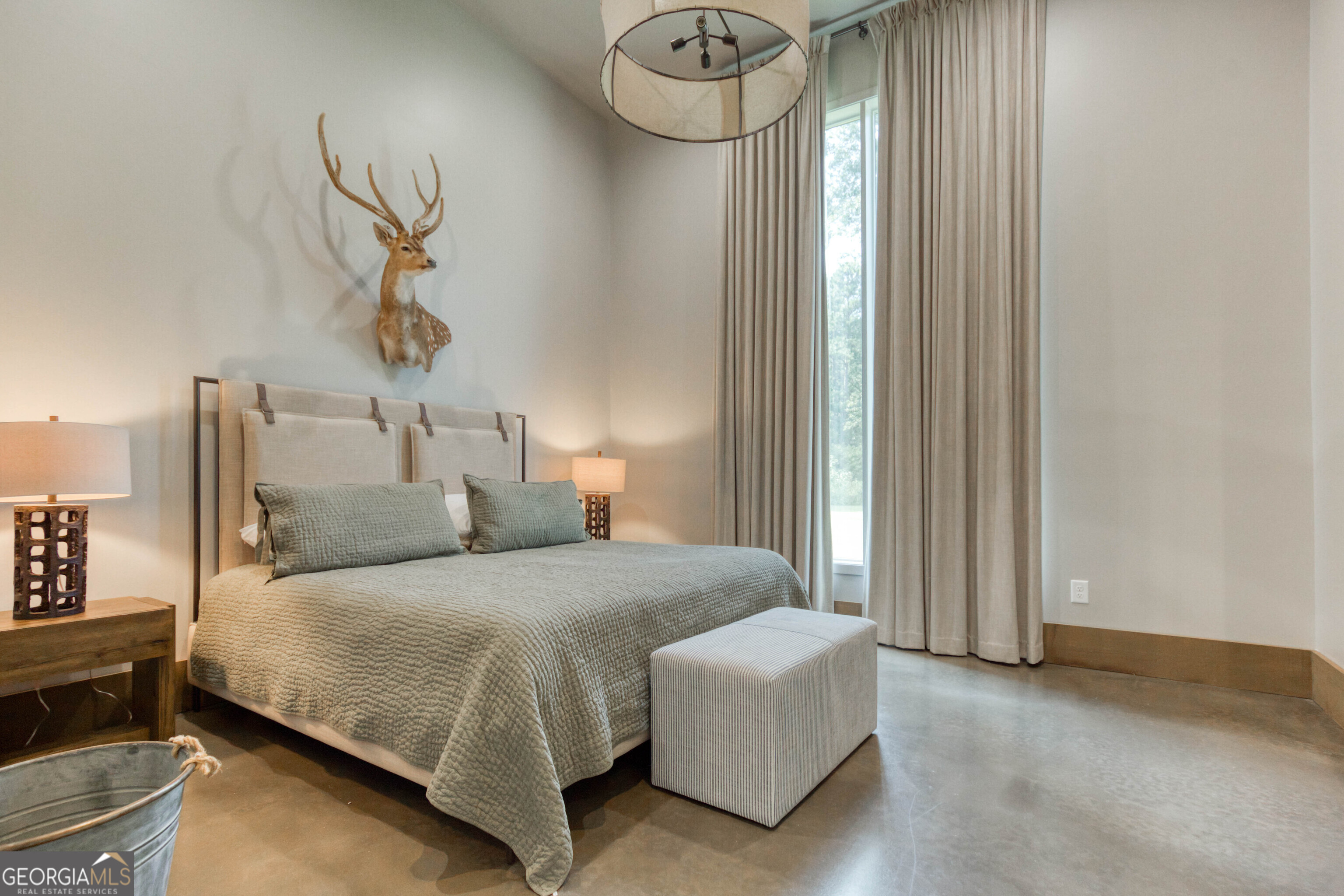 1968 Bobby Brown State Park Road Elberton, GA 30635 - Photo 39 of 97 a bedroom with a bed and a night stand next to a window