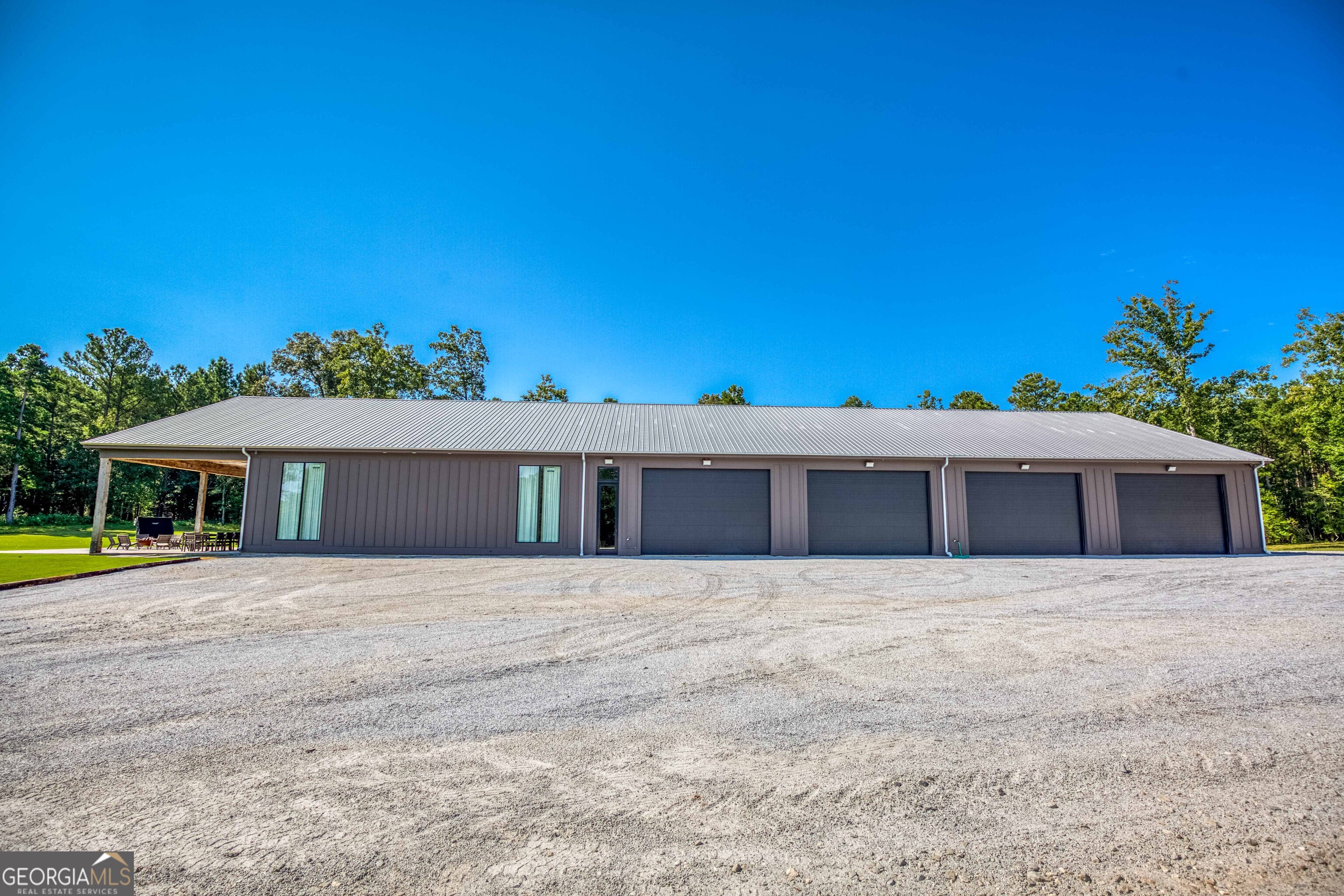 1968 Bobby Brown State Park Road Elberton, GA 30635 - Photo 59 of 97 a front view of a house with a yard and trees