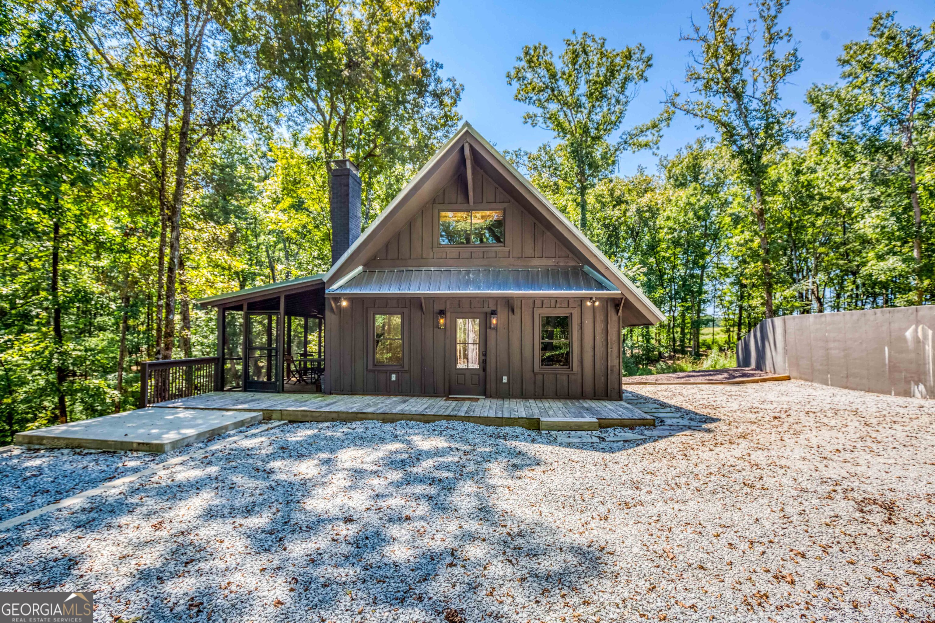 1968 Bobby Brown State Park Road Elberton, GA 30635 - Photo 71 of 97 a front view of a house with a yard and garage