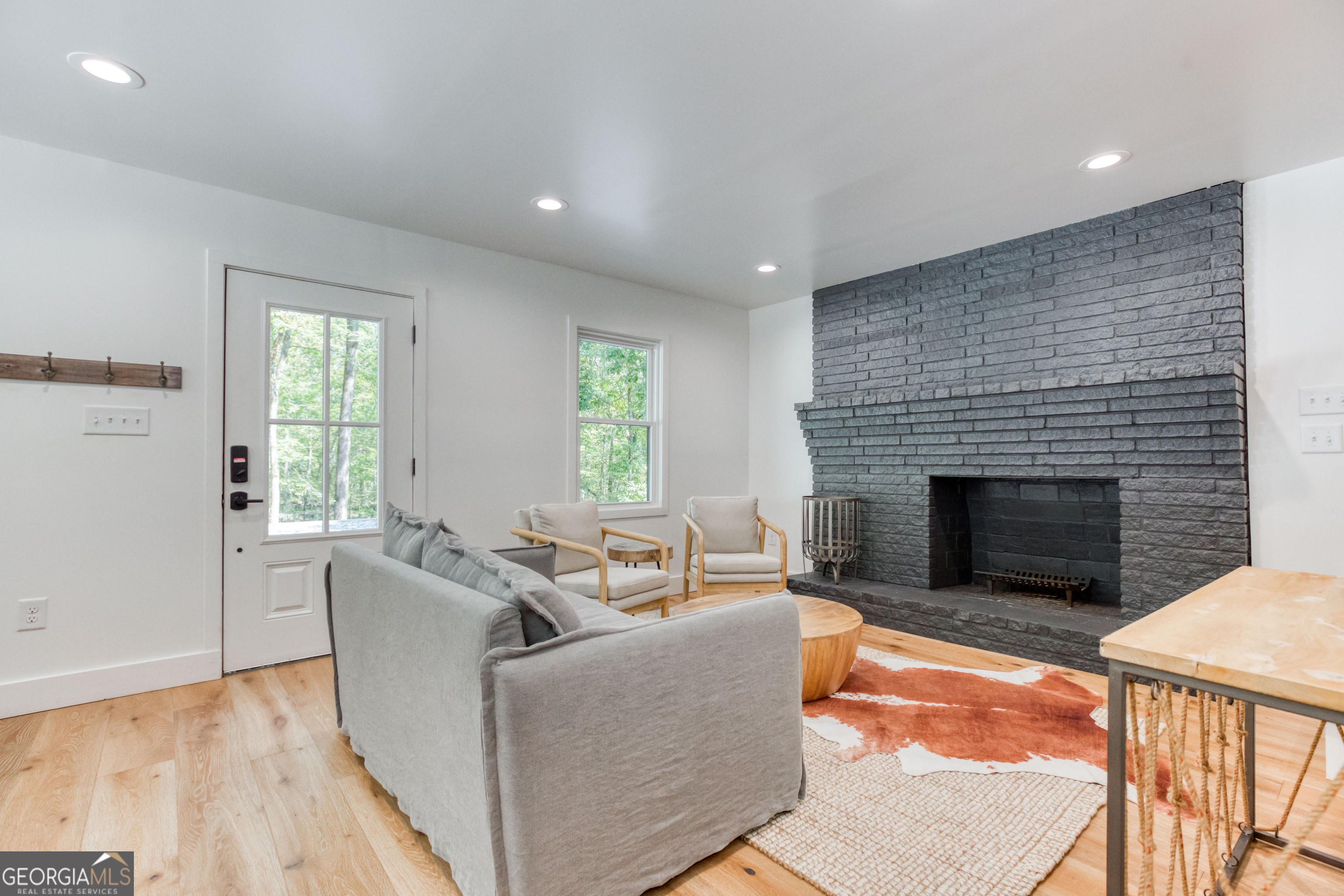 1968 Bobby Brown State Park Road Elberton, GA 30635 - Photo 75 of 97 a living room with furniture and a fireplace