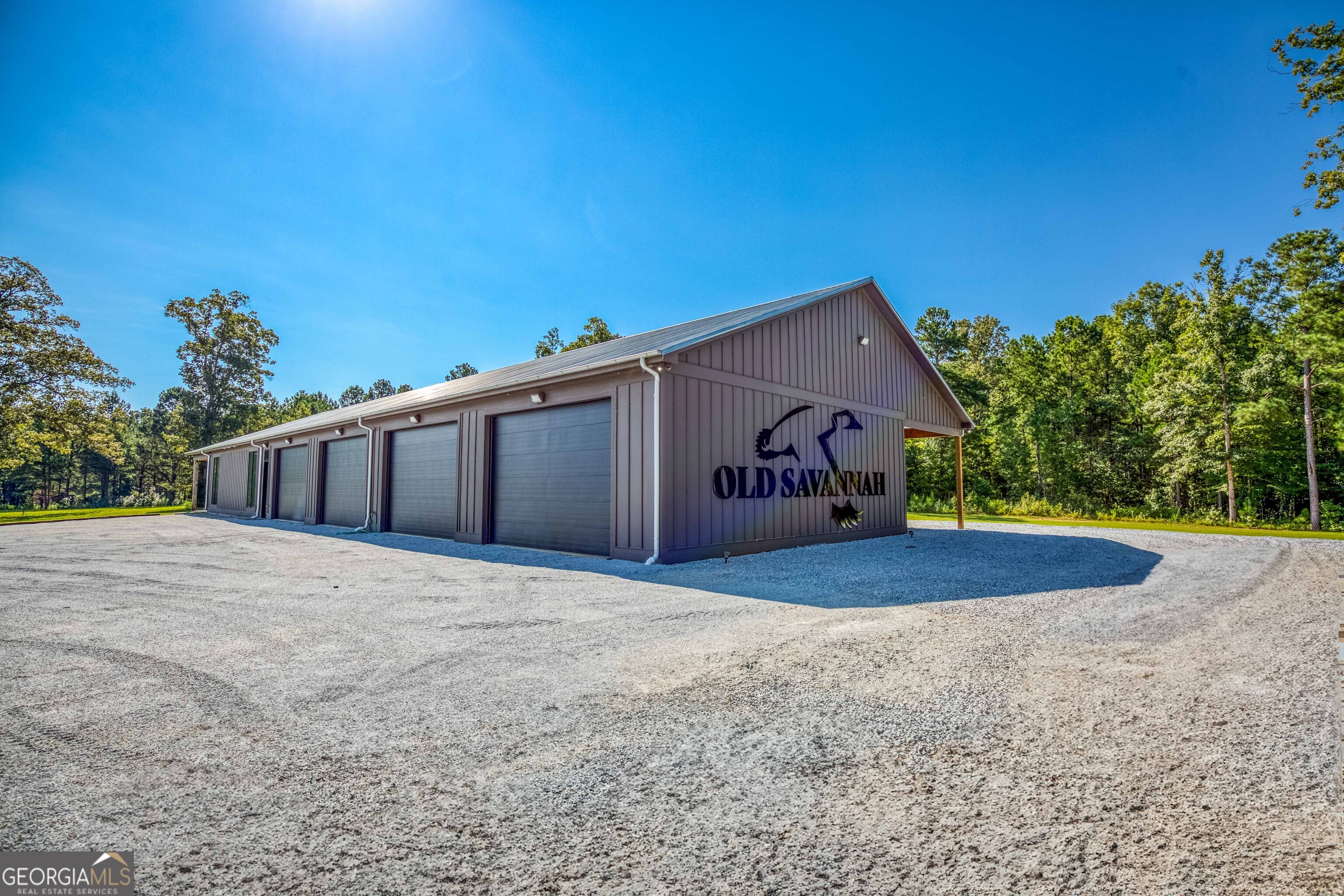 1968 Bobby Brown State Park Road Elberton, GA 30635 - Photo 10 of 97 a front view of a house with a yard and garage