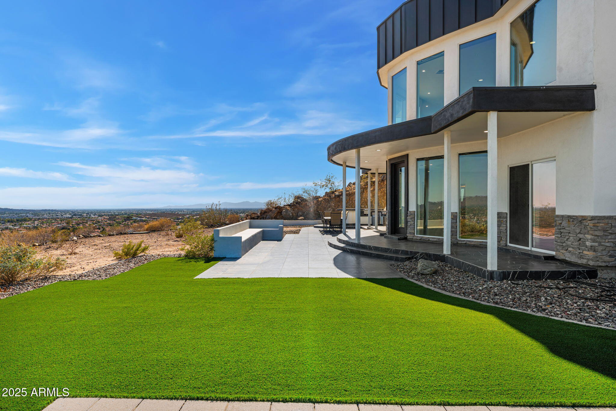 18812 North 22nd Street Phoenix, AZ 85024 - Photo 12 of 71 a view of a house with swimming pool and porch
