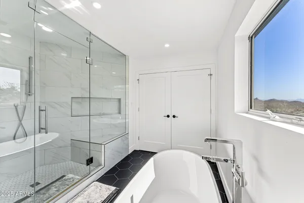 a bathroom with a sink toilet and mirror