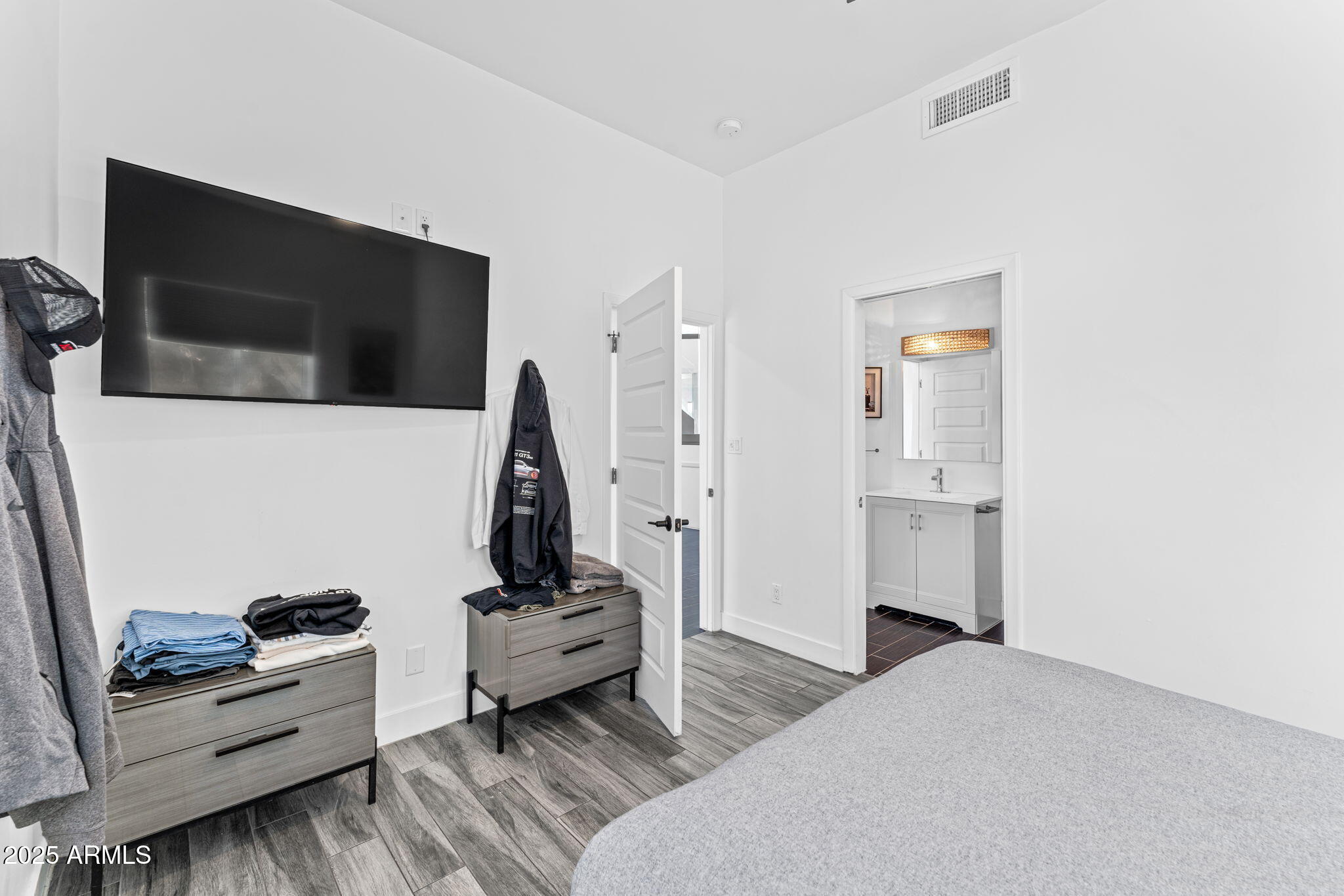 18812 North 22nd Street Phoenix, AZ 85024 - Photo 32 of 71 a living room with furniture and a flat screen tv