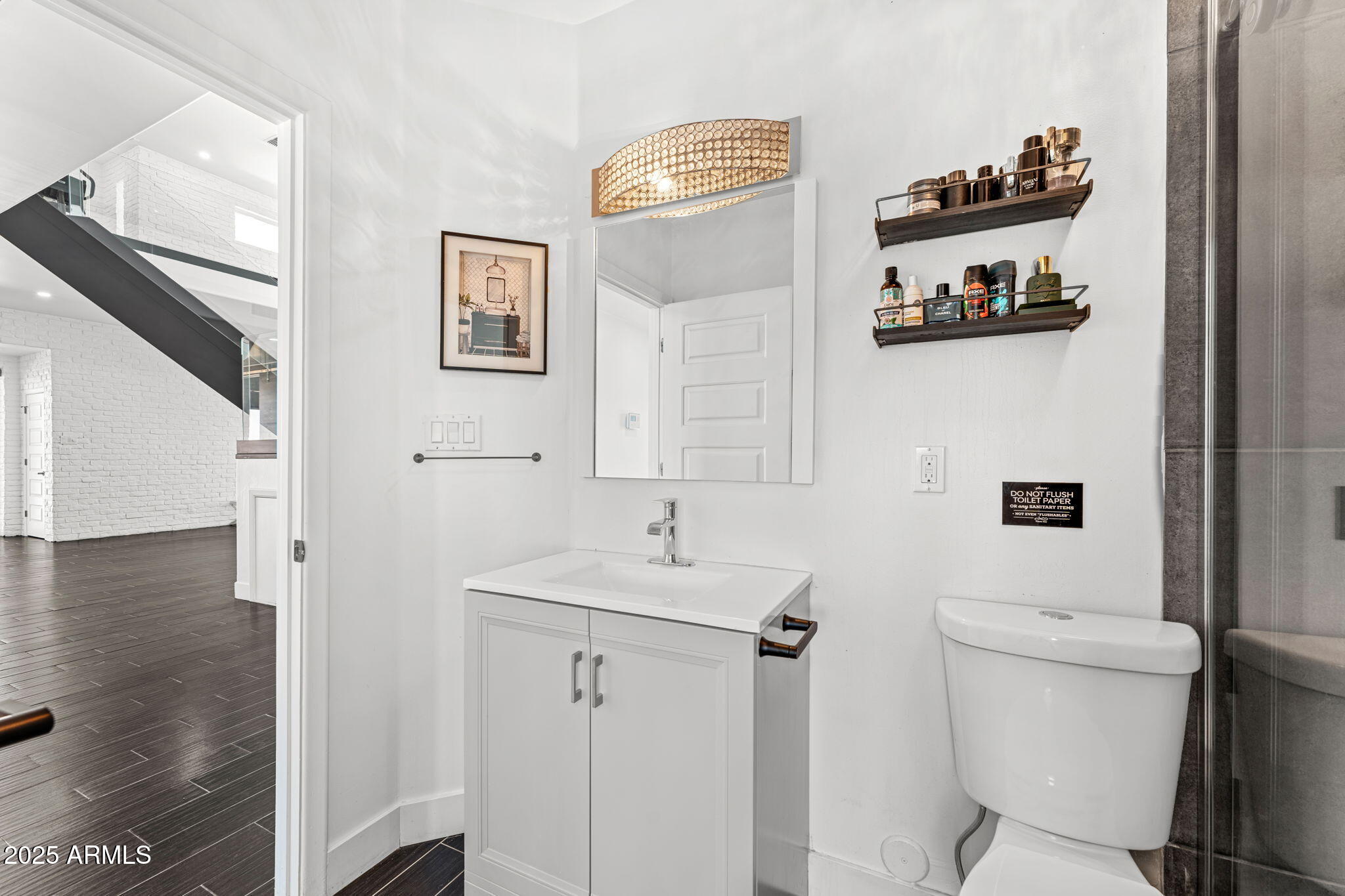 18812 North 22nd Street Phoenix, AZ 85024 - Photo 34 of 71 a bathroom with a sink mirror toilet and vanity